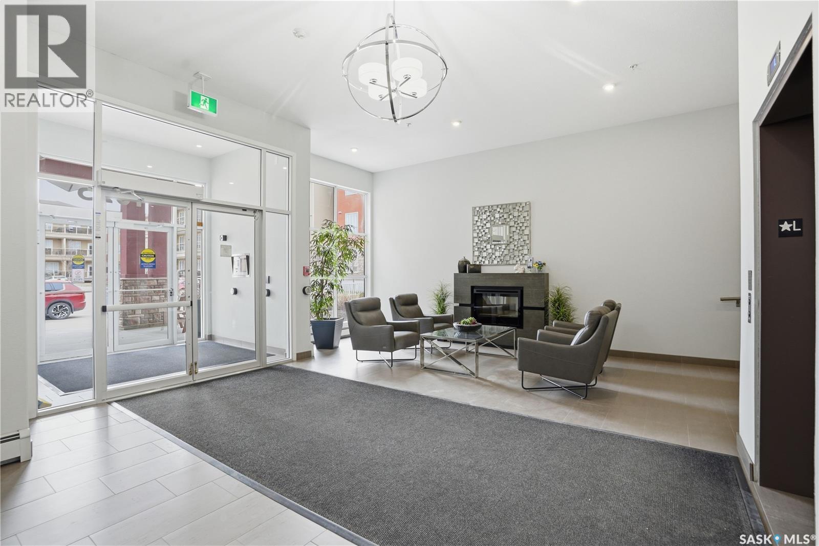 323 1025 Moss Avenue, Saskatoon, SK - Indoor With Fireplace