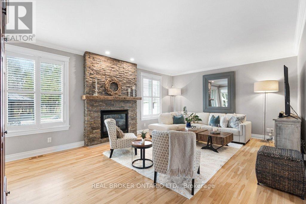 32 Feldspar Crescent, Ottawa, ON - Indoor Photo Showing Living Room With Fireplace