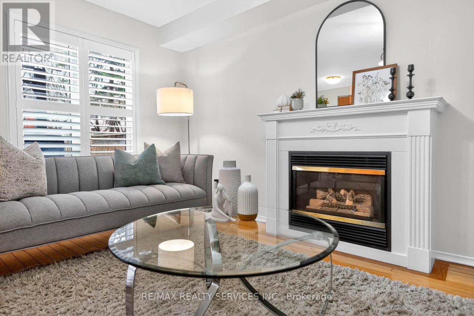 6 Creekwood Drive, Brampton, ON - Indoor Photo Showing Living Room With Fireplace