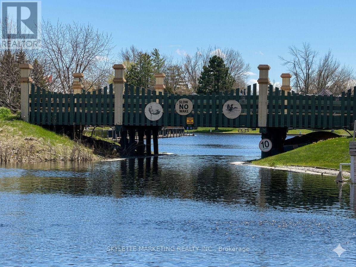 24 - 2 Paradise Boulevard, Ramara, ON - Outdoor With Body Of Water With View