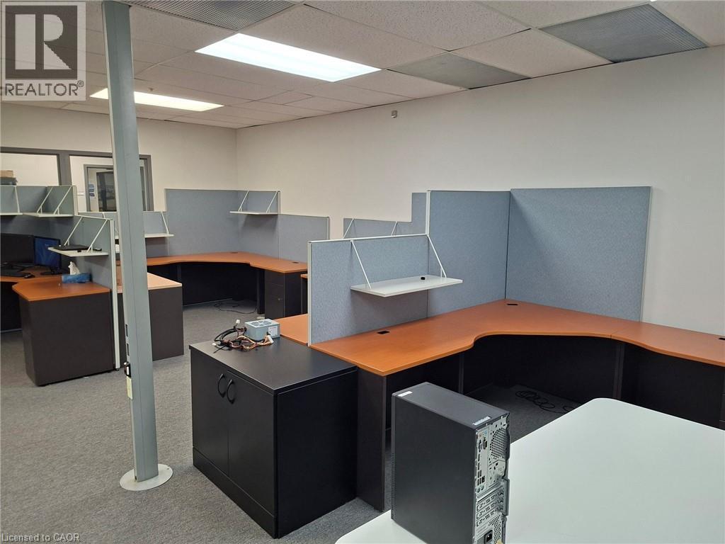Commercial office interior featuring multiple workstation cubicles - 920 Sheldon Court, Burlington, ON