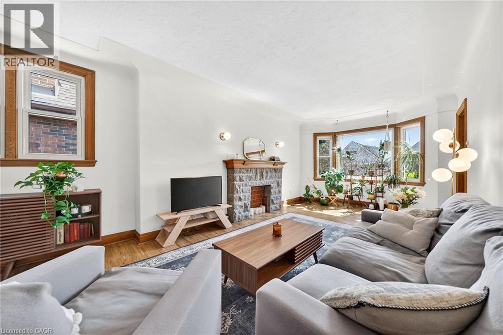 188 Wexford Avenue S, Hamilton, ON - Indoor Photo Showing Living Room With Fireplace