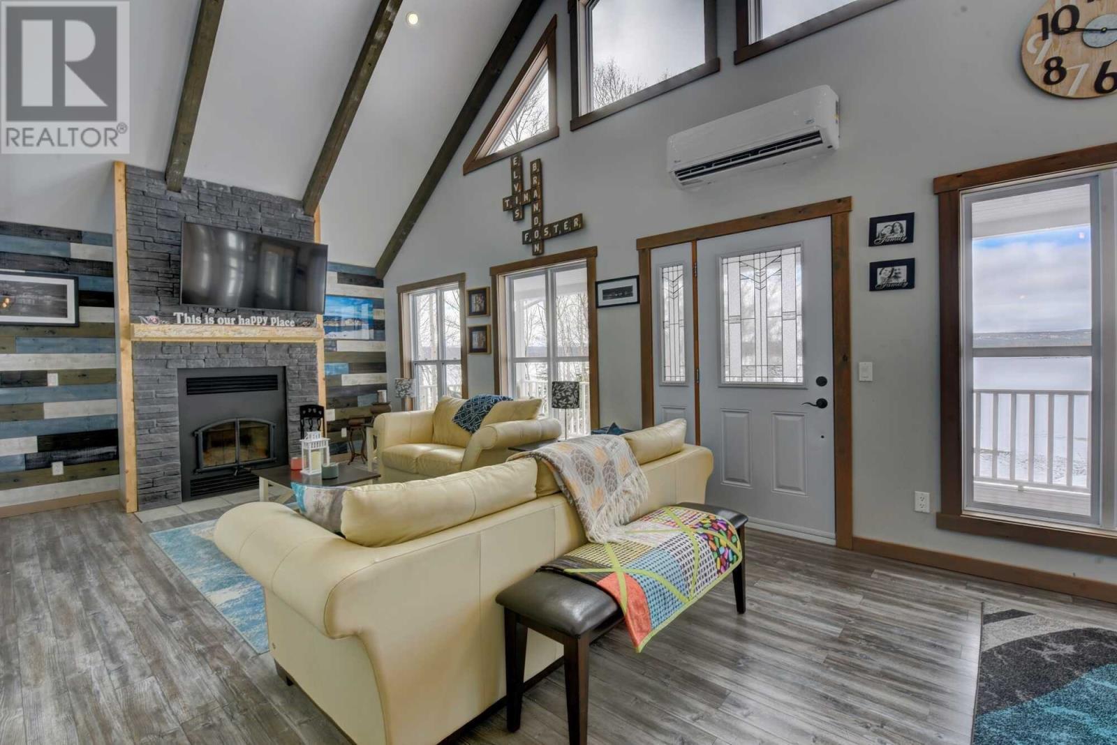 10 Lunch Point, Howley, NL - Indoor Photo Showing Living Room With Fireplace