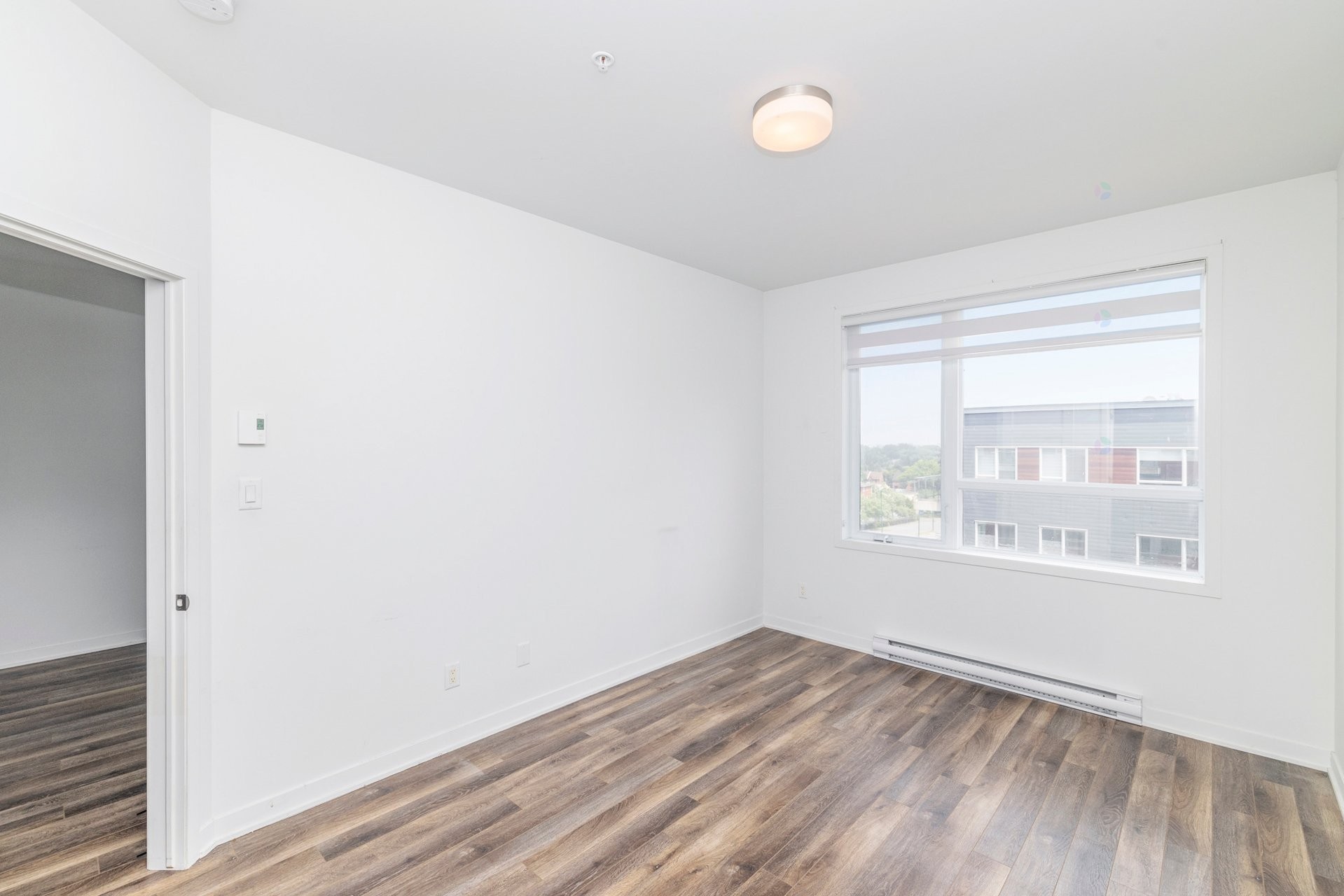 Chambre à coucher principale - 806-740 Av. Victoria, Saint-Lambert, QC - Indoor Photo Showing Other Room