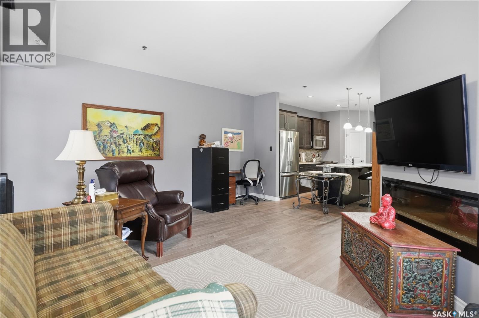 104 4891 Trinity Lane, Regina, SK - Indoor Photo Showing Living Room