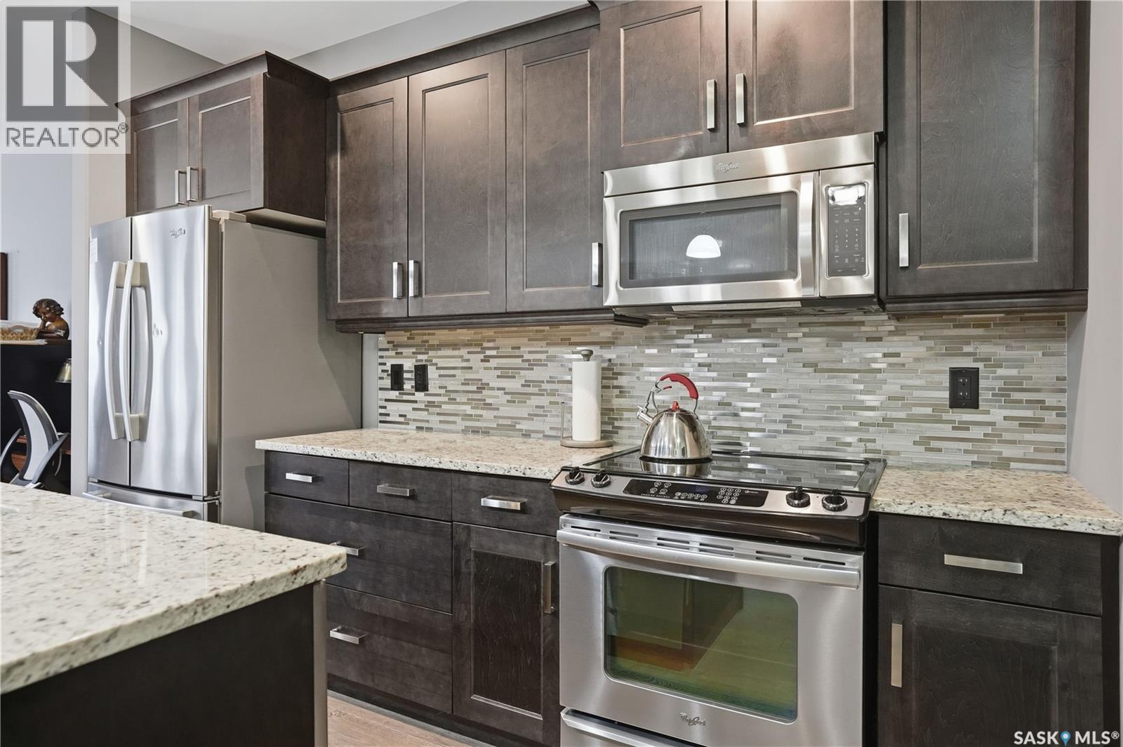 104 4891 Trinity Lane, Regina, SK - Indoor Photo Showing Kitchen With Upgraded Kitchen