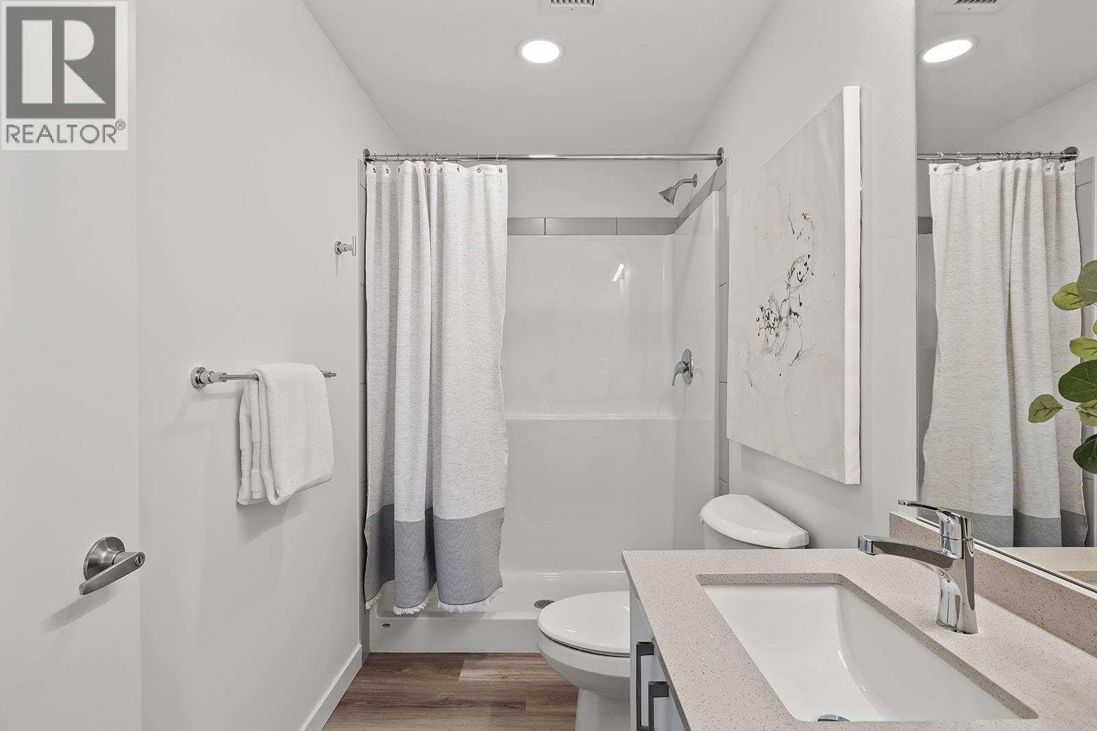 Primary Ensuite. Photos may be of a similar home in the community. - 1111 Frost Road Unit# 202, Kelowna, BC - Indoor Photo Showing Bathroom