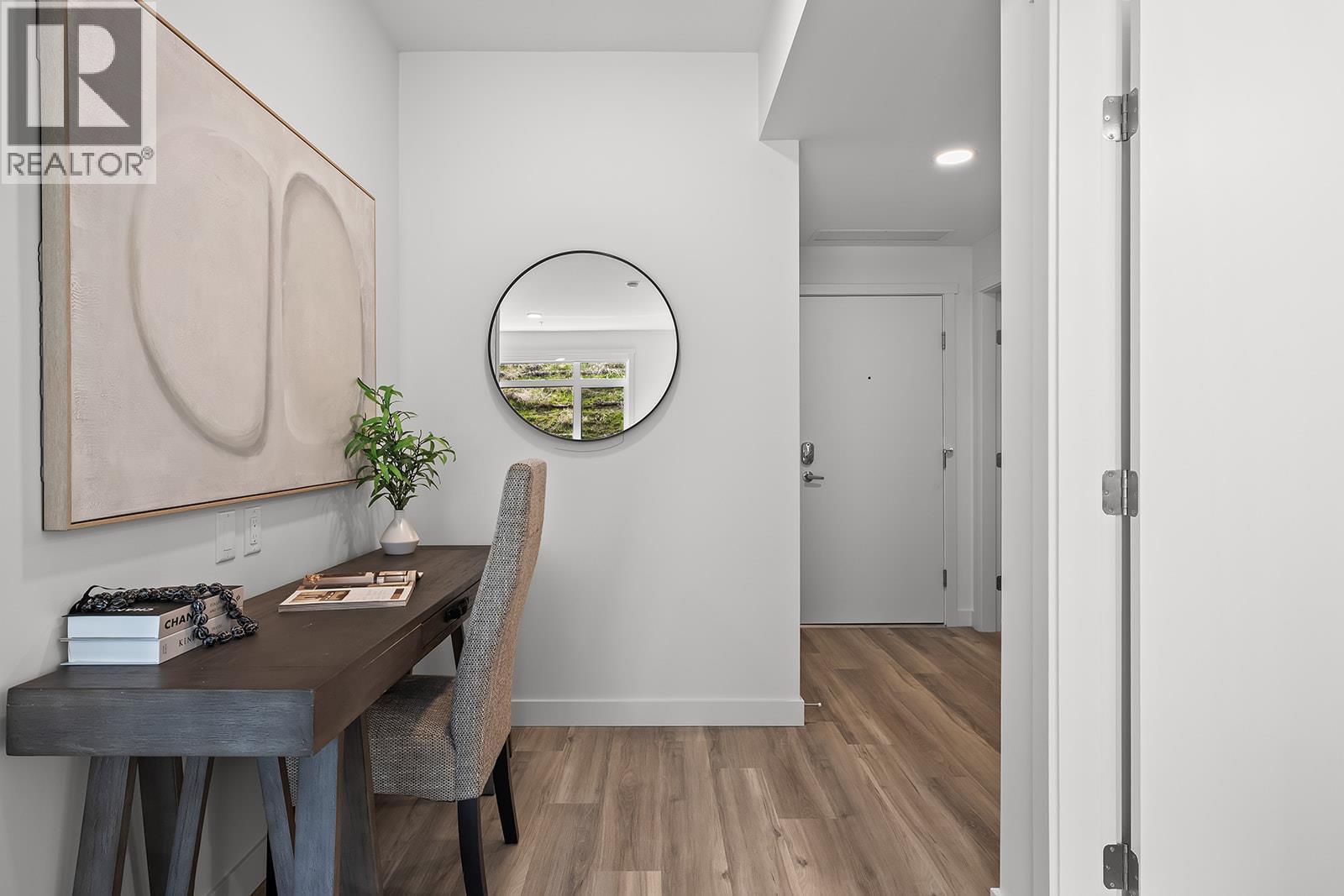 Foyer with Nook. Photos may be of a similar home in the community. - 1111 Frost Road Unit# 202, Kelowna, BC - Indoor