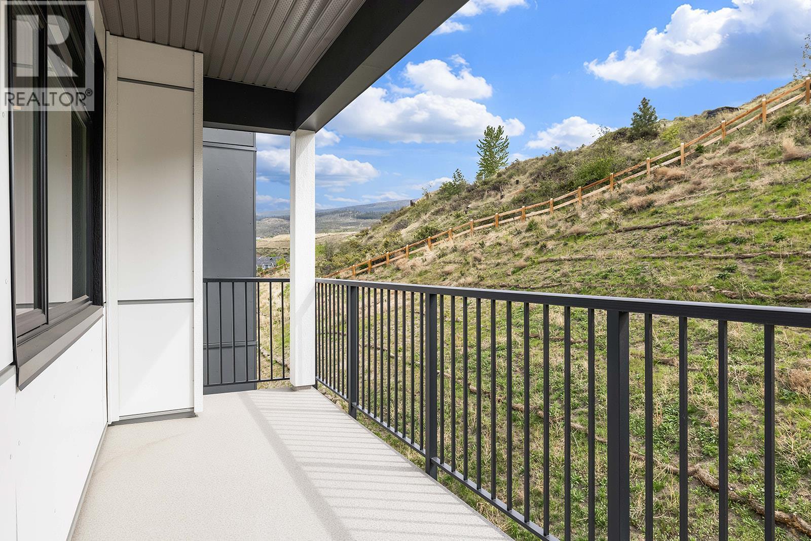 Patio. Photos may be of a similar home in the community. - 1111 Frost Road Unit# 202, Kelowna, BC - Outdoor With Balcony With Exterior