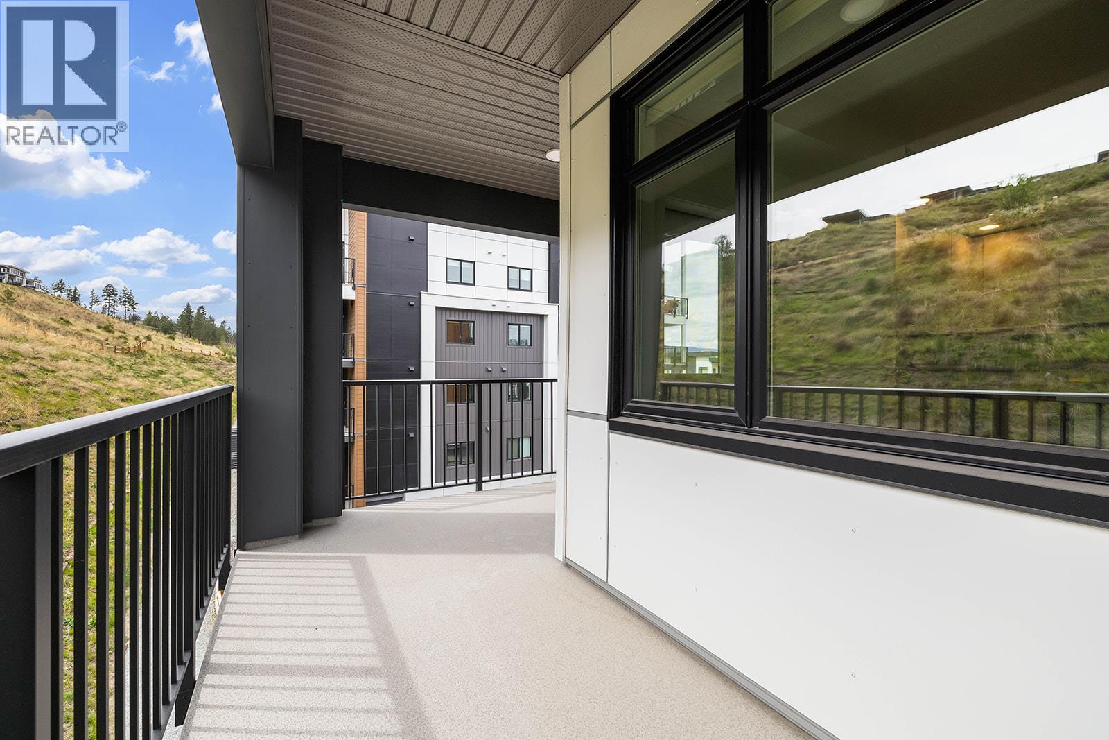 Patio. Photos may be of a similar home in the community. - 1111 Frost Road Unit# 202, Kelowna, BC - Outdoor With Balcony With Exterior