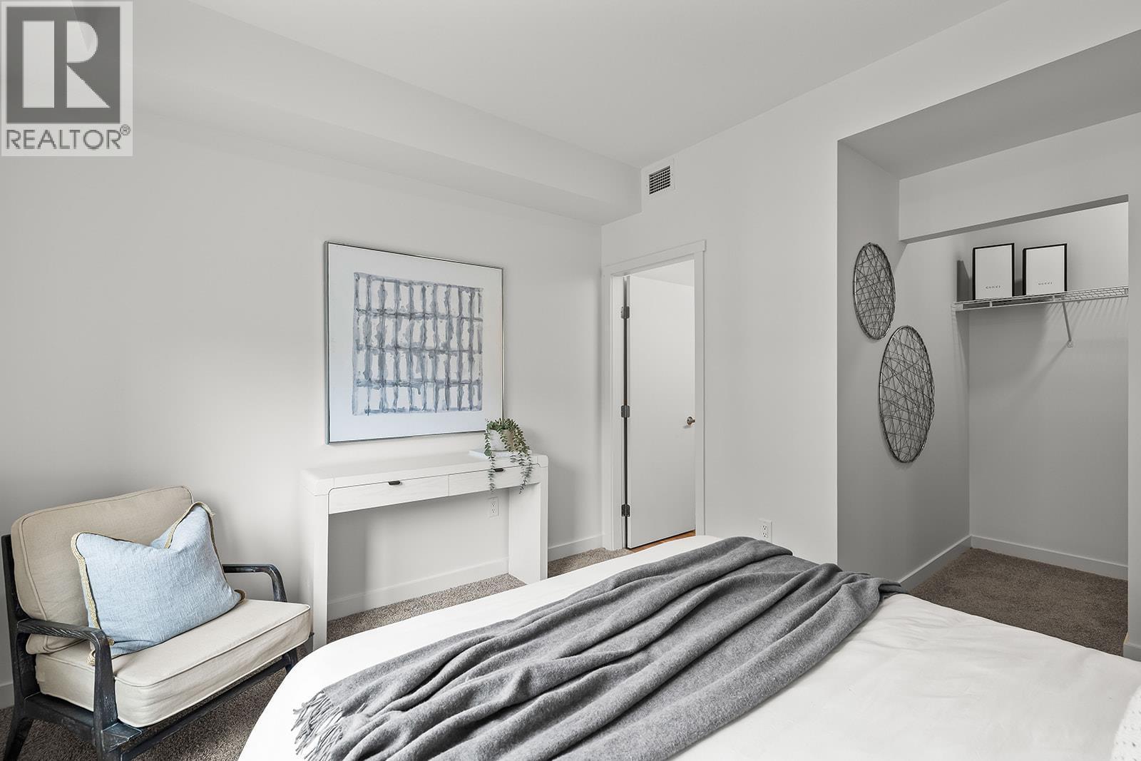 Primary Bedroom. Photos may be of a similar home in the community. - 1111 Frost Road Unit# 202, Kelowna, BC - Indoor Photo Showing Bedroom
