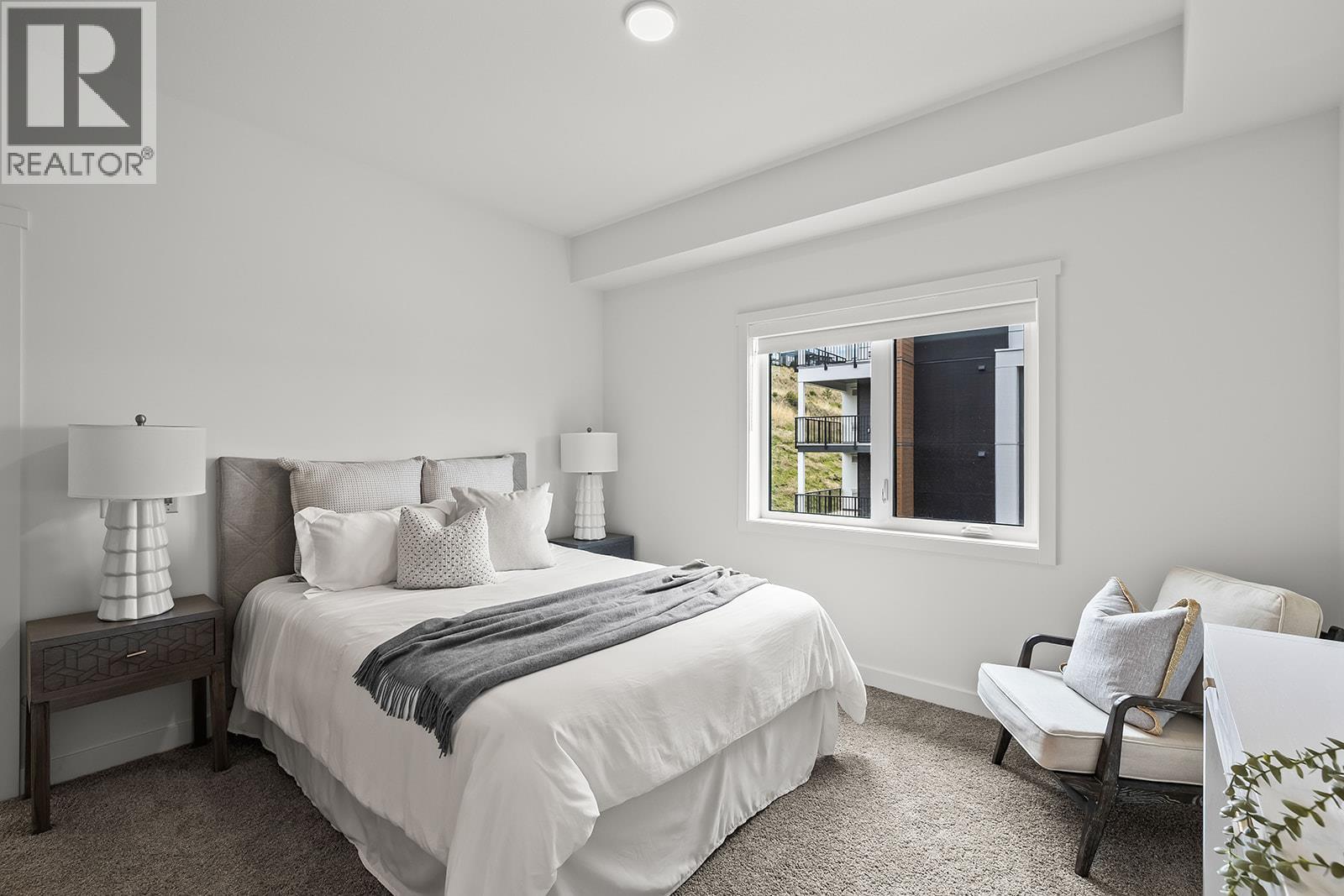 Primary Bedroom. Photos may be of a similar home in the community. - 1111 Frost Road Unit# 202, Kelowna, BC - Indoor Photo Showing Bedroom