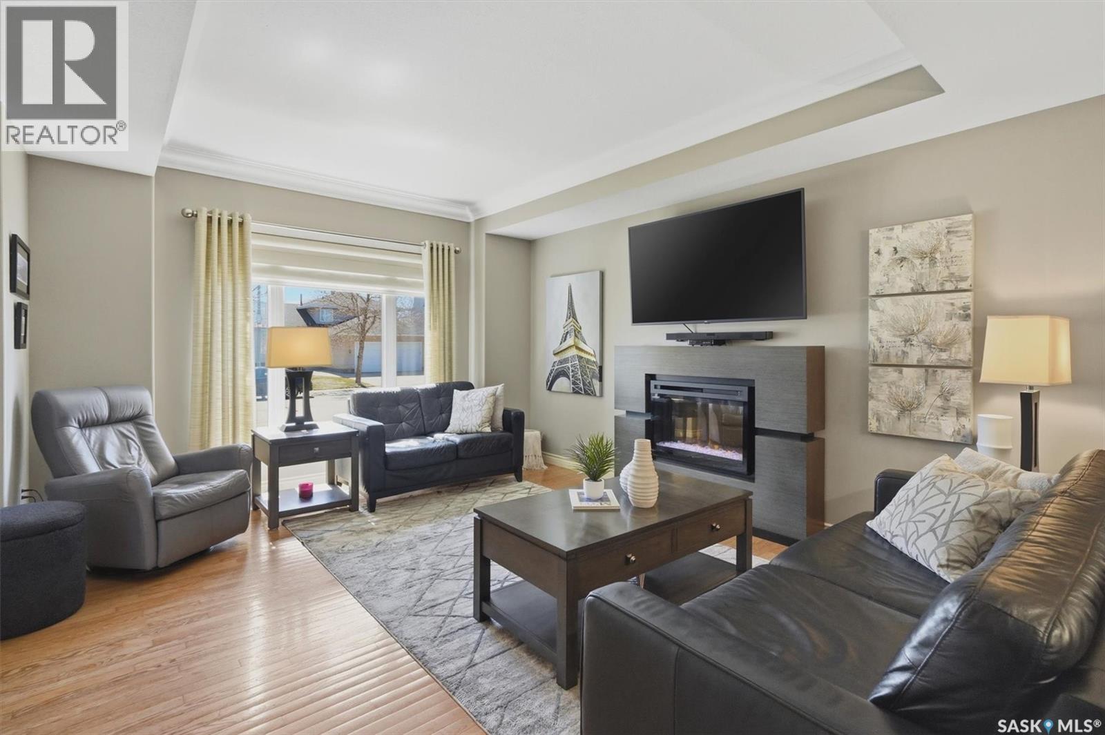 227 Brightwater Way, Saskatoon, SK - Indoor Photo Showing Living Room With Fireplace