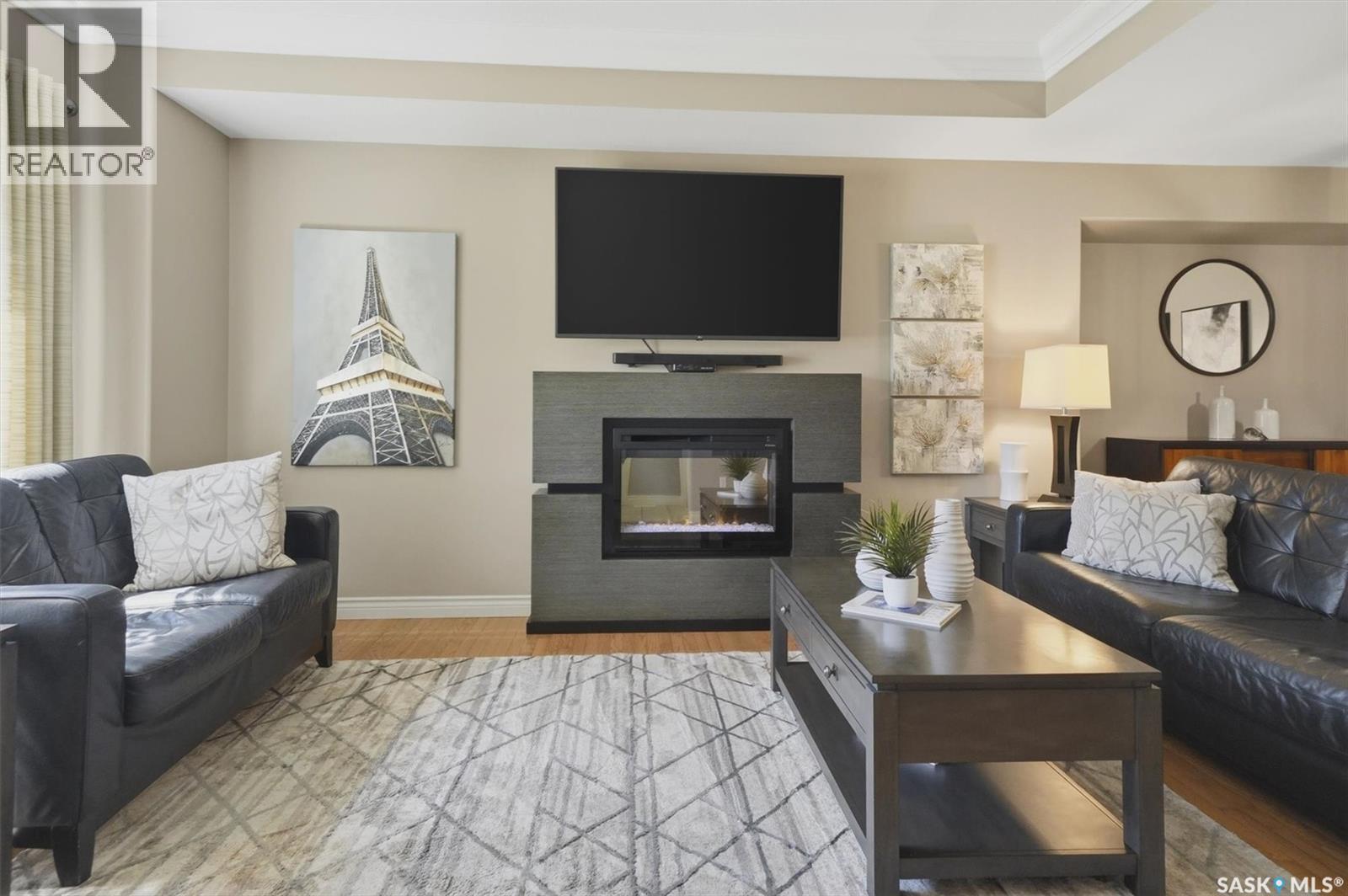 227 Brightwater Way, Saskatoon, SK - Indoor Photo Showing Living Room With Fireplace