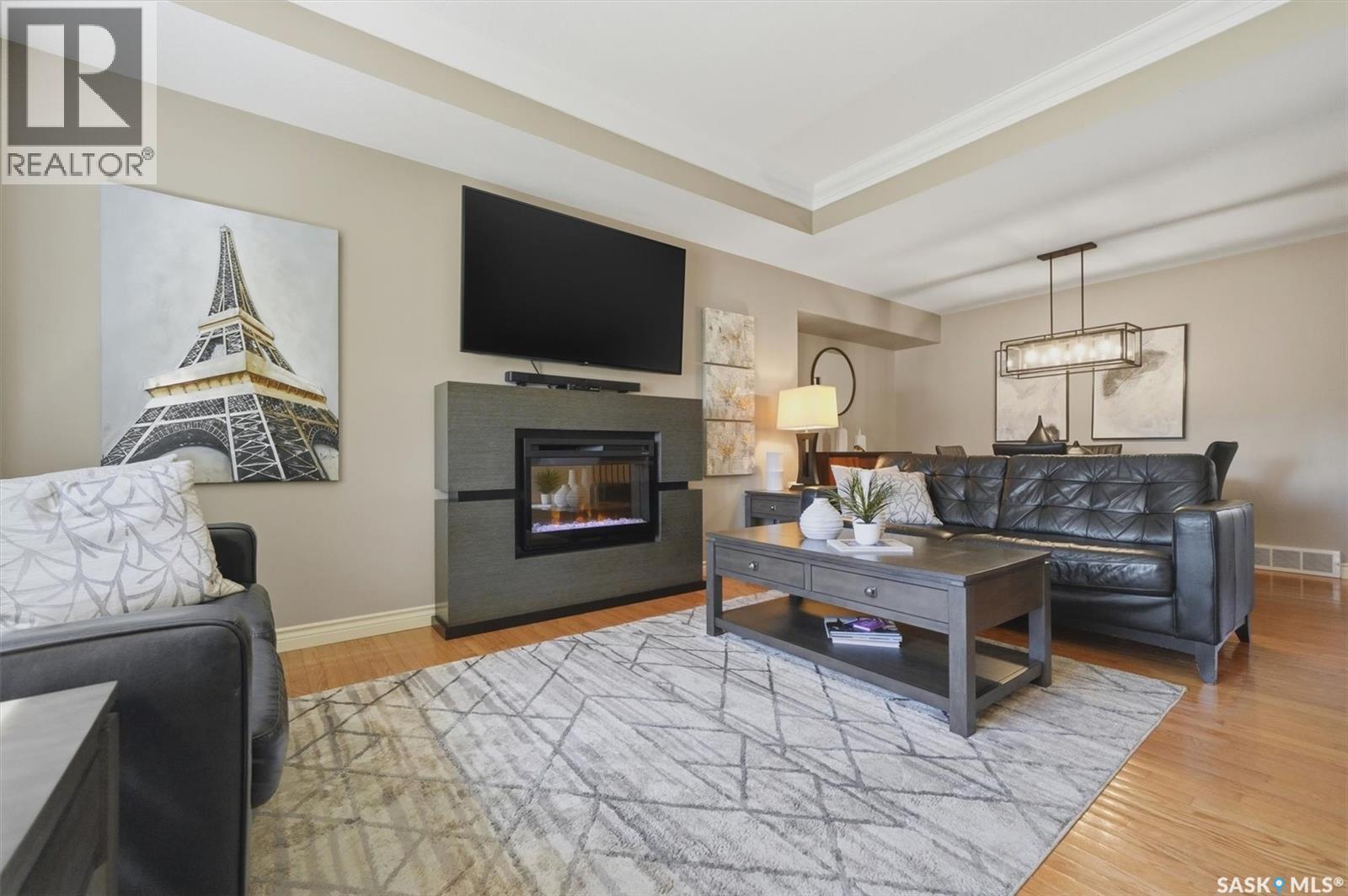 227 Brightwater Way, Saskatoon, SK - Indoor Photo Showing Living Room With Fireplace