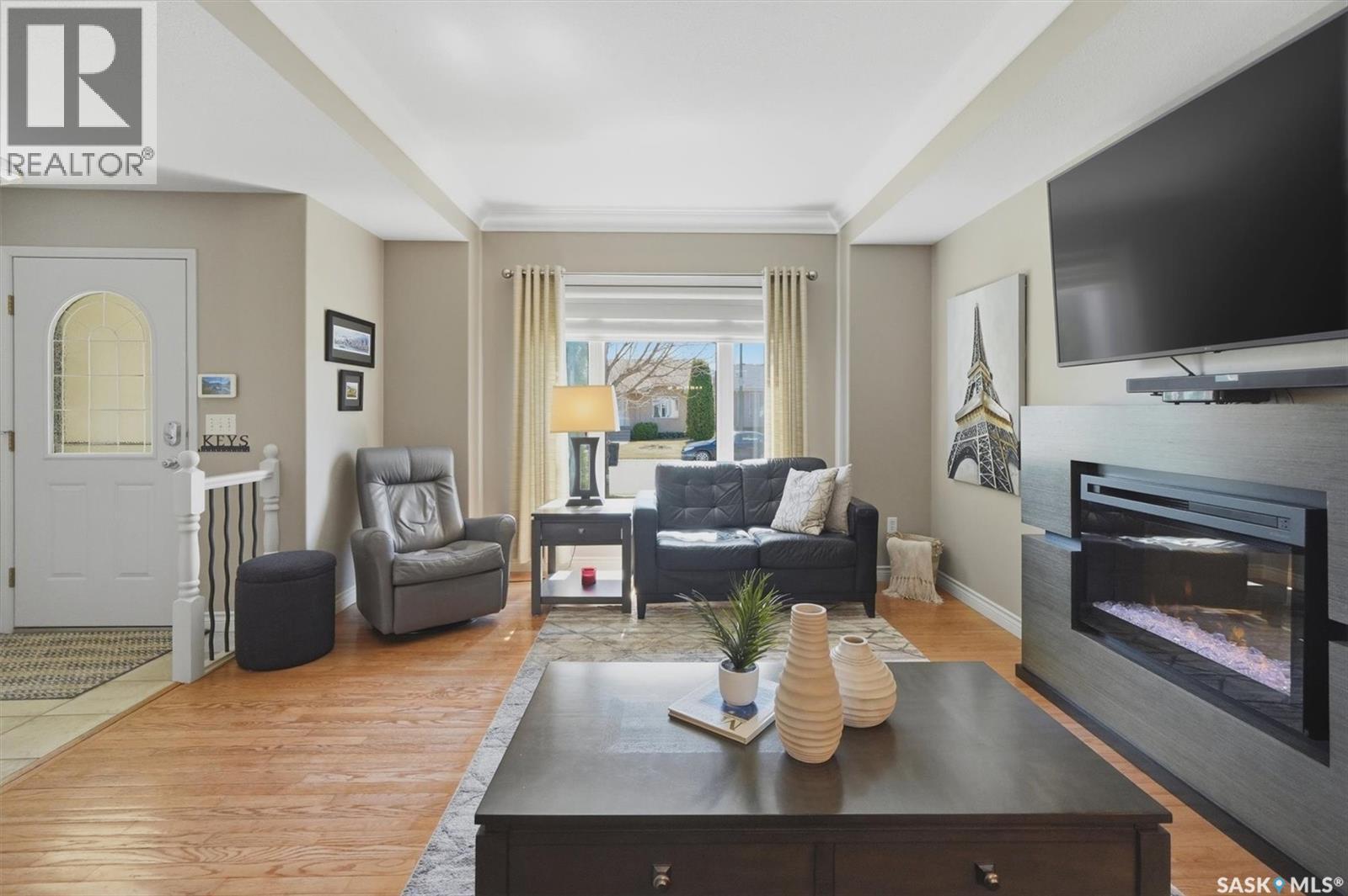 227 Brightwater Way, Saskatoon, SK - Indoor Photo Showing Living Room With Fireplace