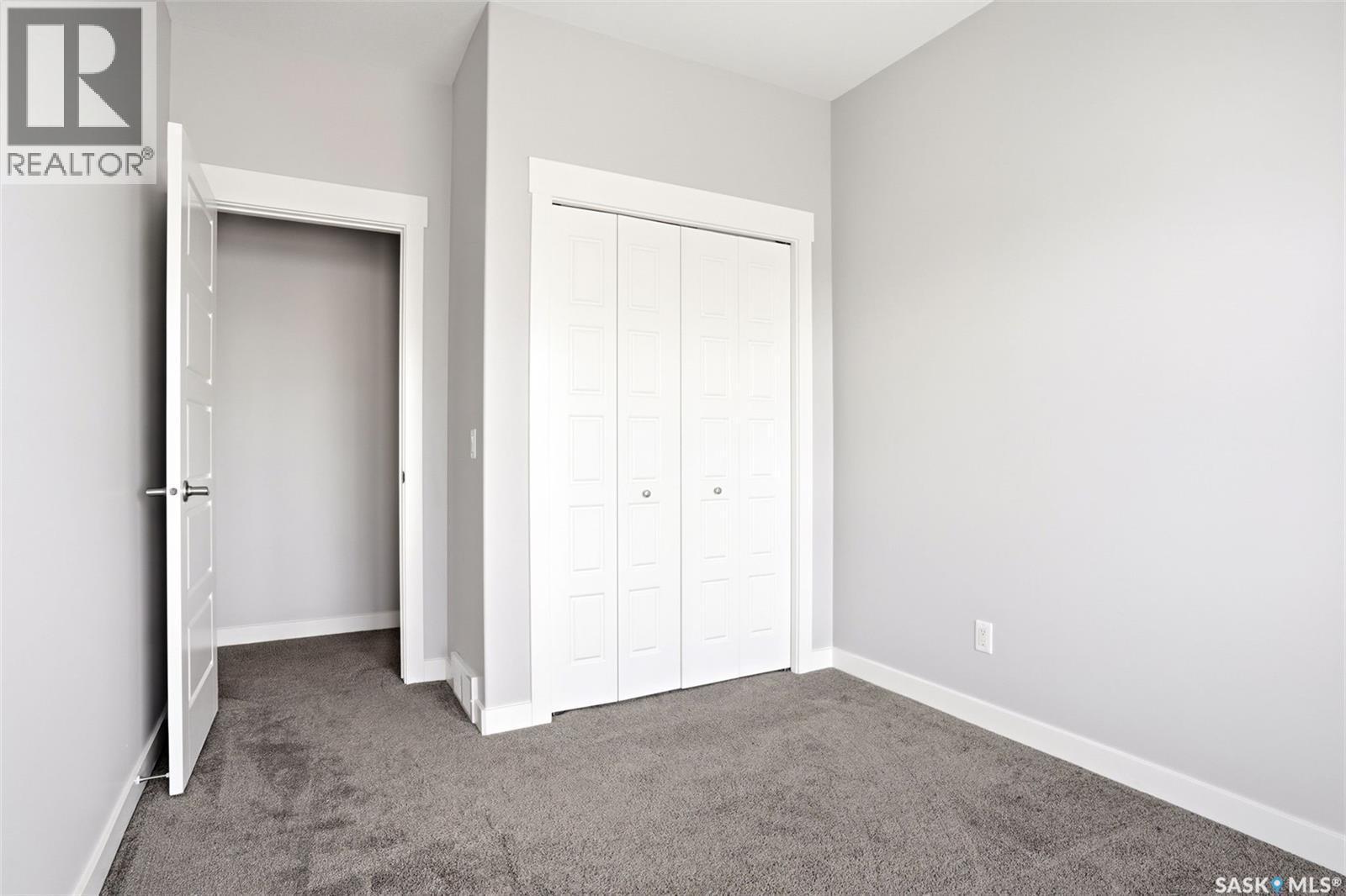 5734 Glide Crescent, Regina, SK - Indoor Photo Showing Other Room