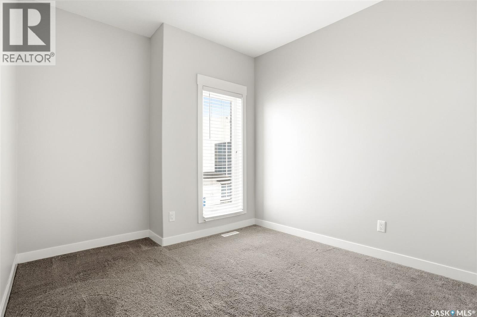 5734 Glide Crescent, Regina, SK - Indoor Photo Showing Other Room