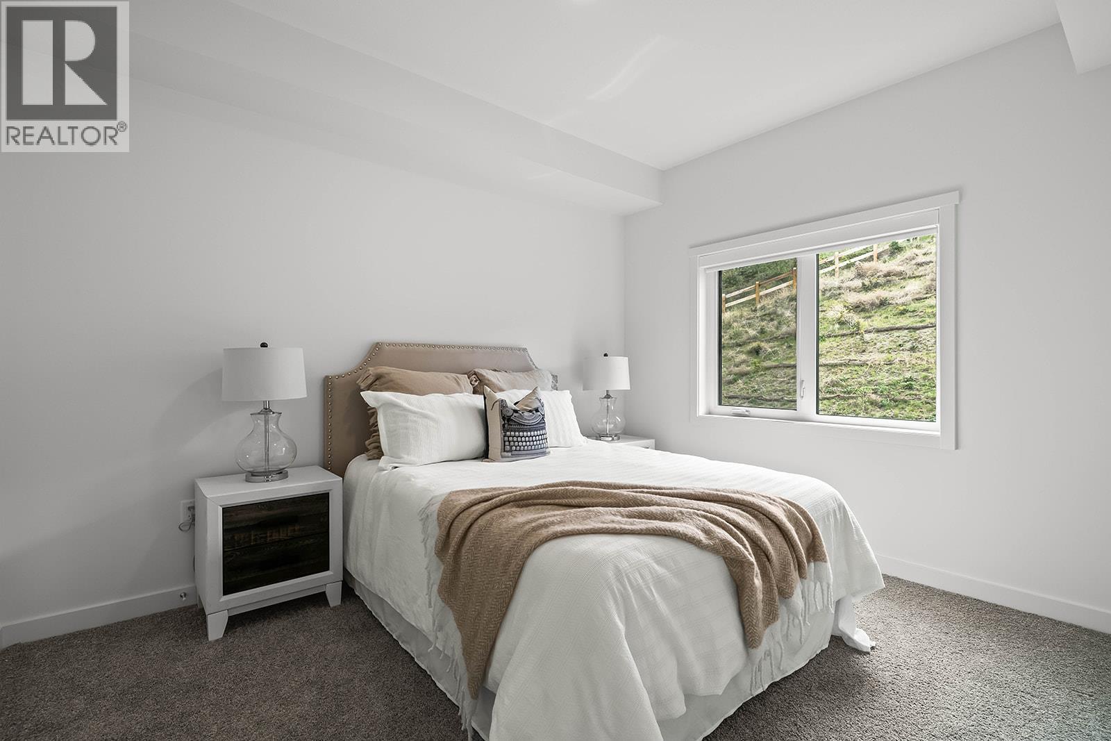 Second Bedroom. Photos may be of a similar home in the community. - 1057 Frost Road Unit# 418, Kelowna, BC - Indoor Photo Showing Bedroom