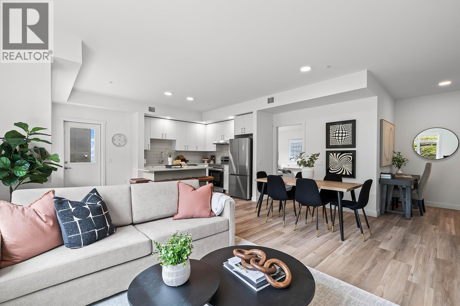 Welcome to #418 1057 Frost Road! Photos may be of a similar home in the community. - 1057 Frost Road Unit# 418, Kelowna, BC - Indoor Photo Showing Living Room