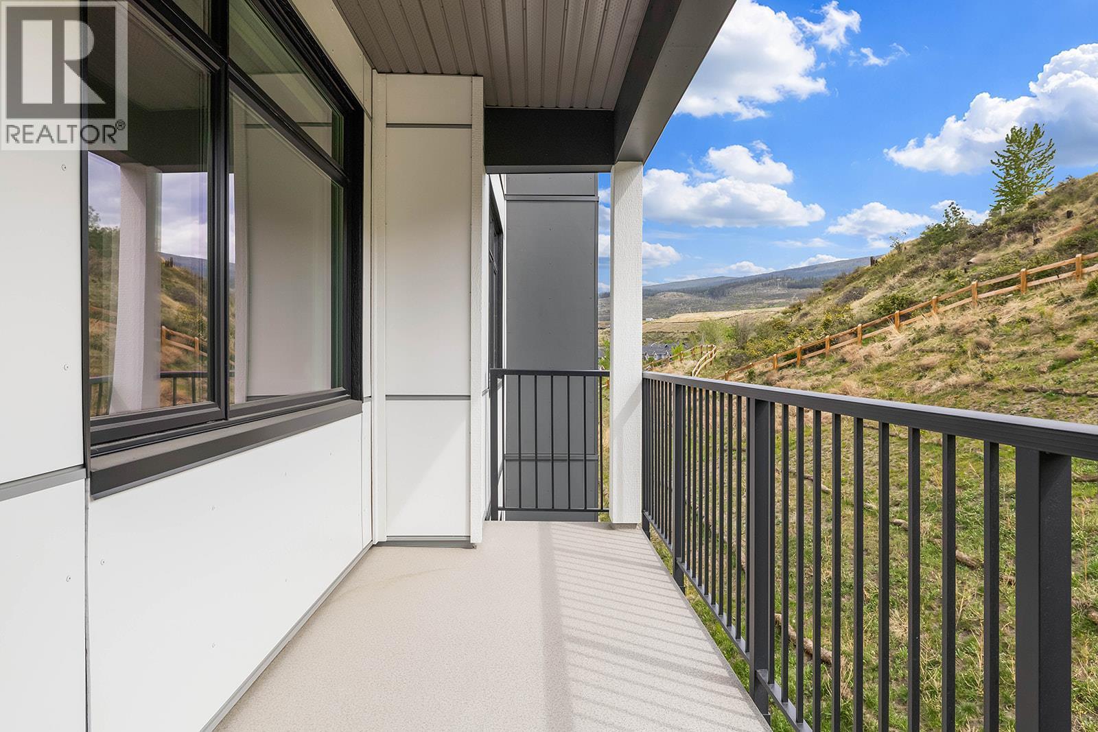 Patio. Photos may be of a similar home in the community. - 1057 Frost Road Unit# 418, Kelowna, BC - Outdoor With Balcony With Exterior