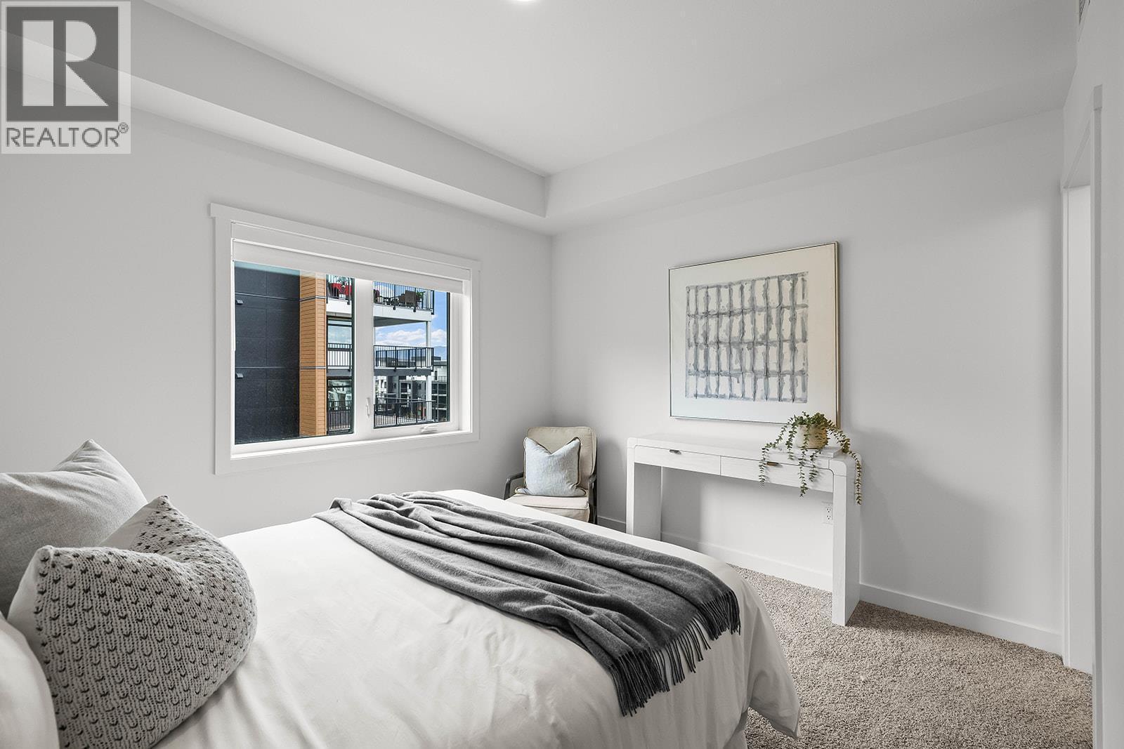 Primary Bedroom. Photos may be of a similar home in the community. - 1057 Frost Road Unit# 418, Kelowna, BC - Indoor Photo Showing Bedroom
