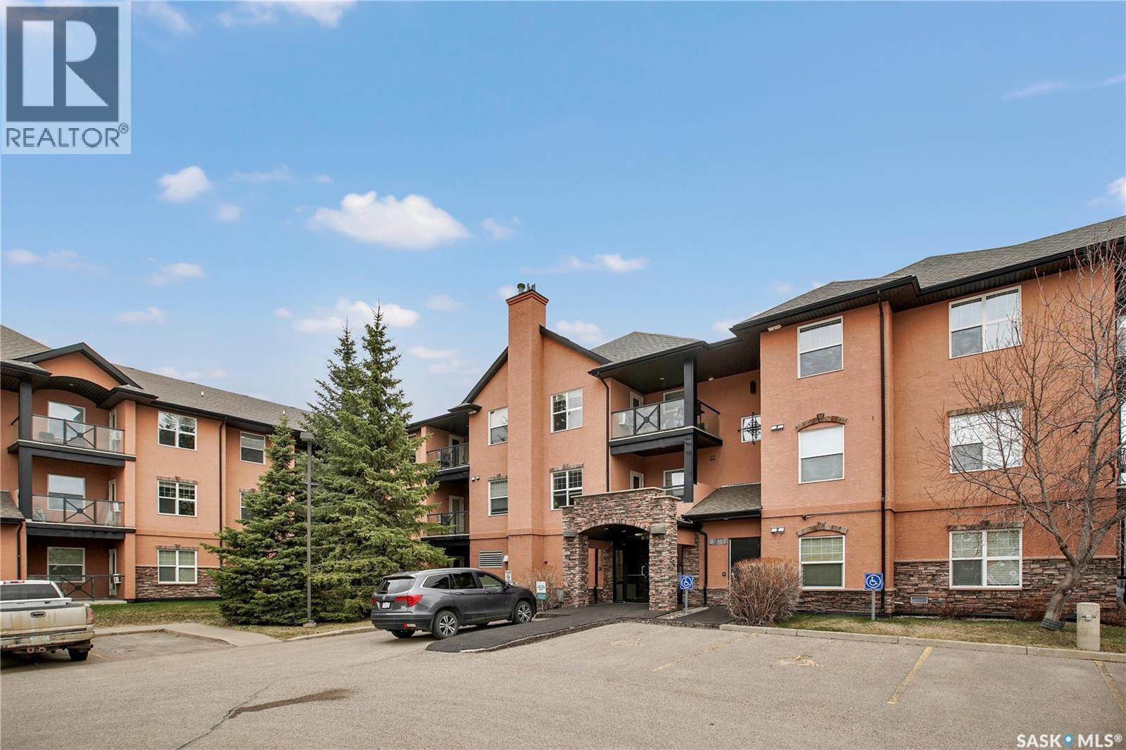 B207 103 Wellman Crescent, Saskatoon, SK - Outdoor With Facade