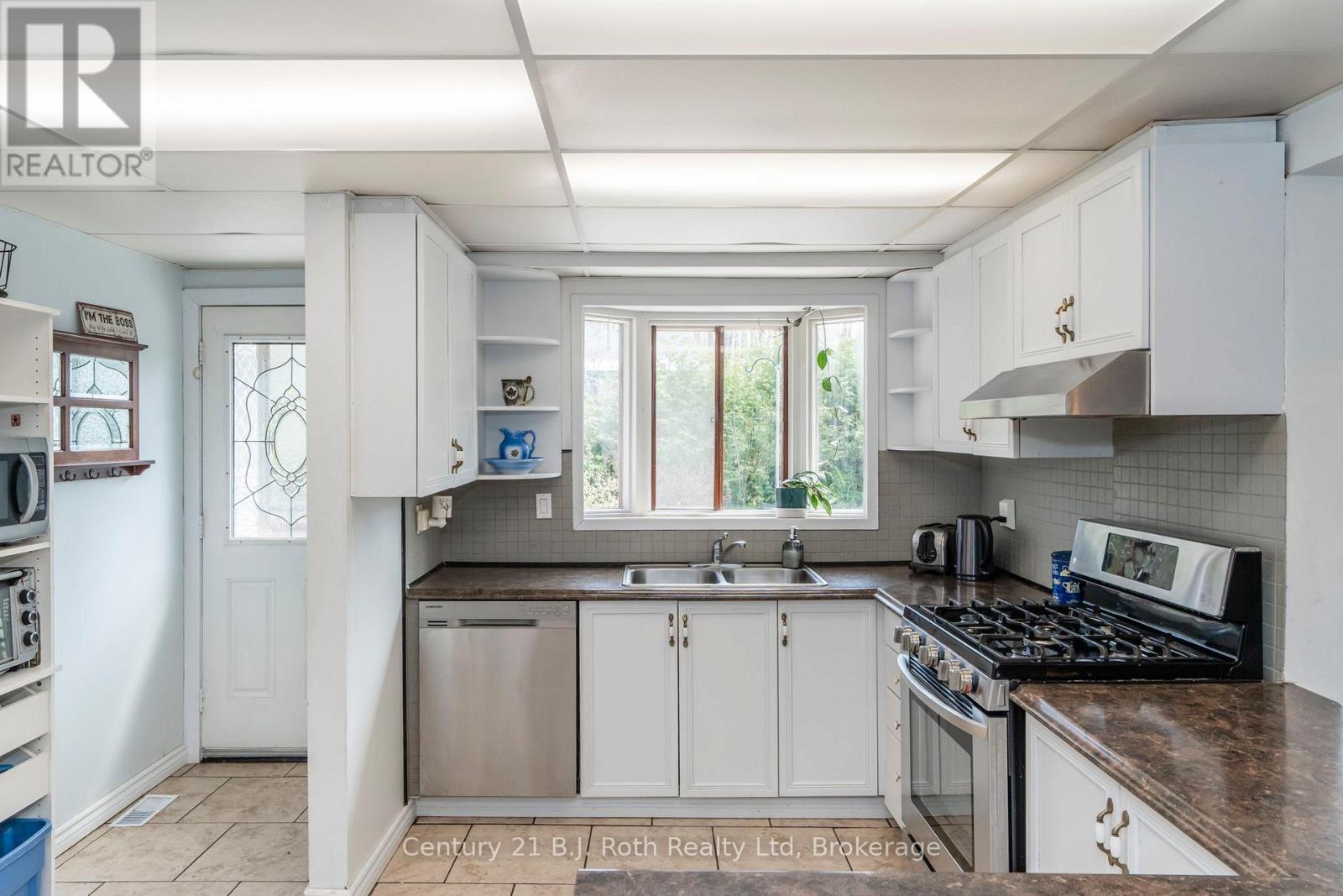 3 Celestine Court, Tiny, ON - Indoor Photo Showing Kitchen With Double Sink