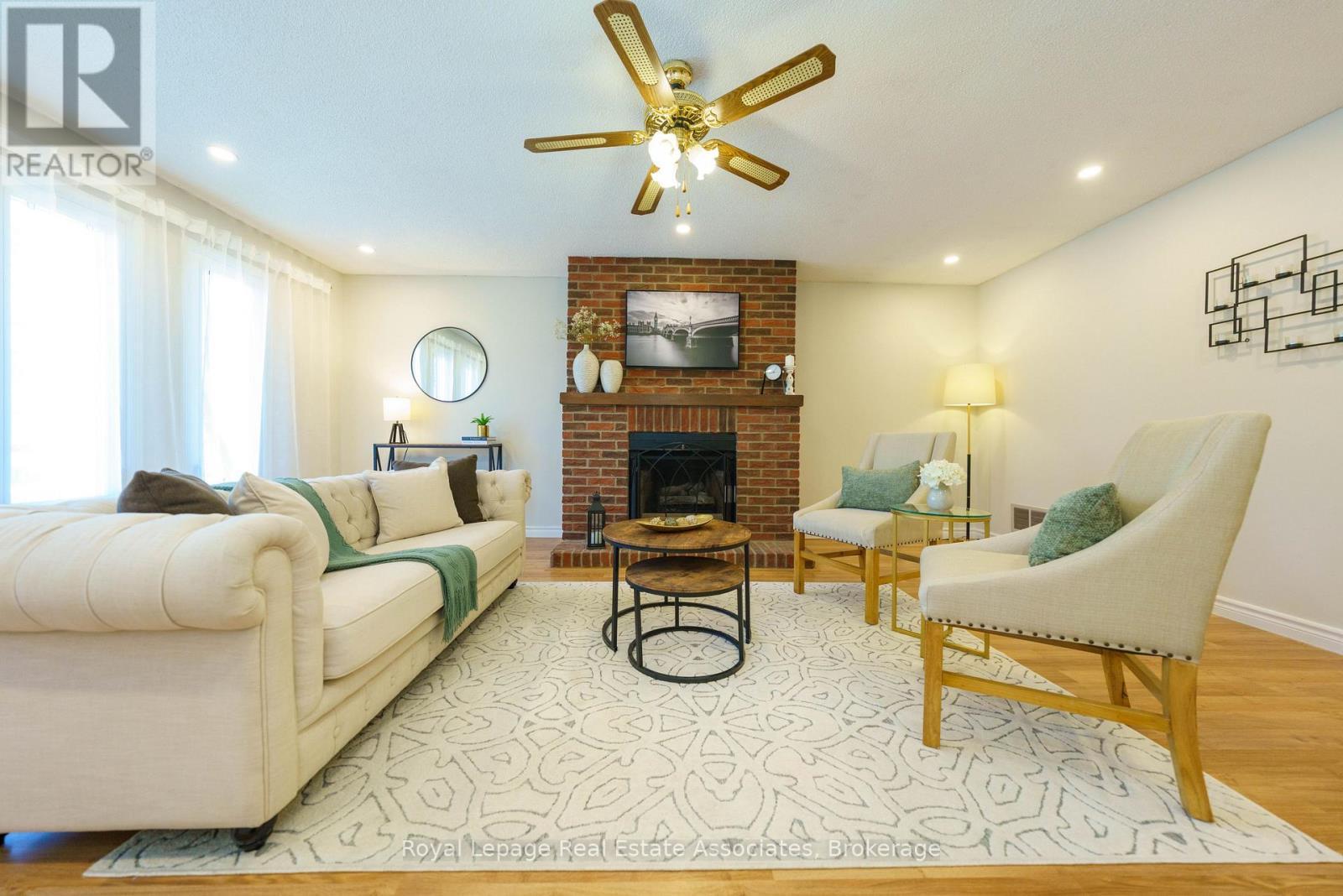 6763 Dolmage Court, Mississauga, ON - Indoor Photo Showing Living Room With Fireplace