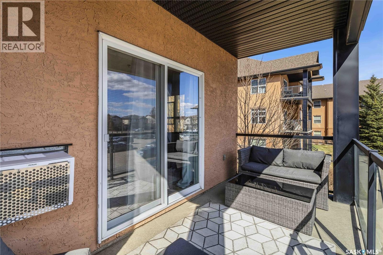 A210 103 Wellman Crescent, Saskatoon, SK - Outdoor With Deck Patio Veranda With Exterior