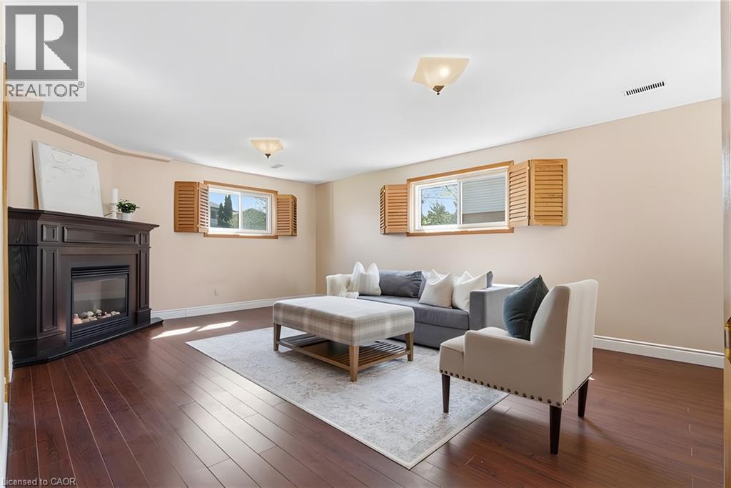 484 Hunterswood Court, Waterloo, ON - Indoor Photo Showing Living Room With Fireplace