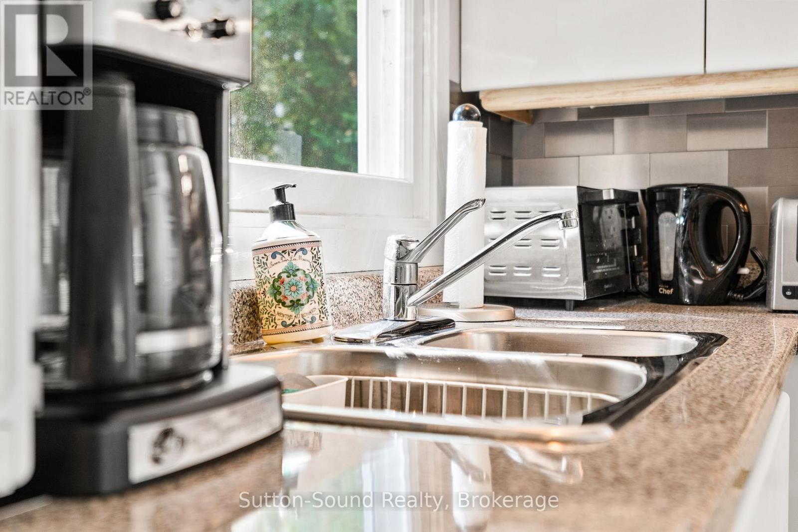 606 Mallory Beach Road, South Bruce Peninsula, ON - Indoor Photo Showing Kitchen With Double Sink
