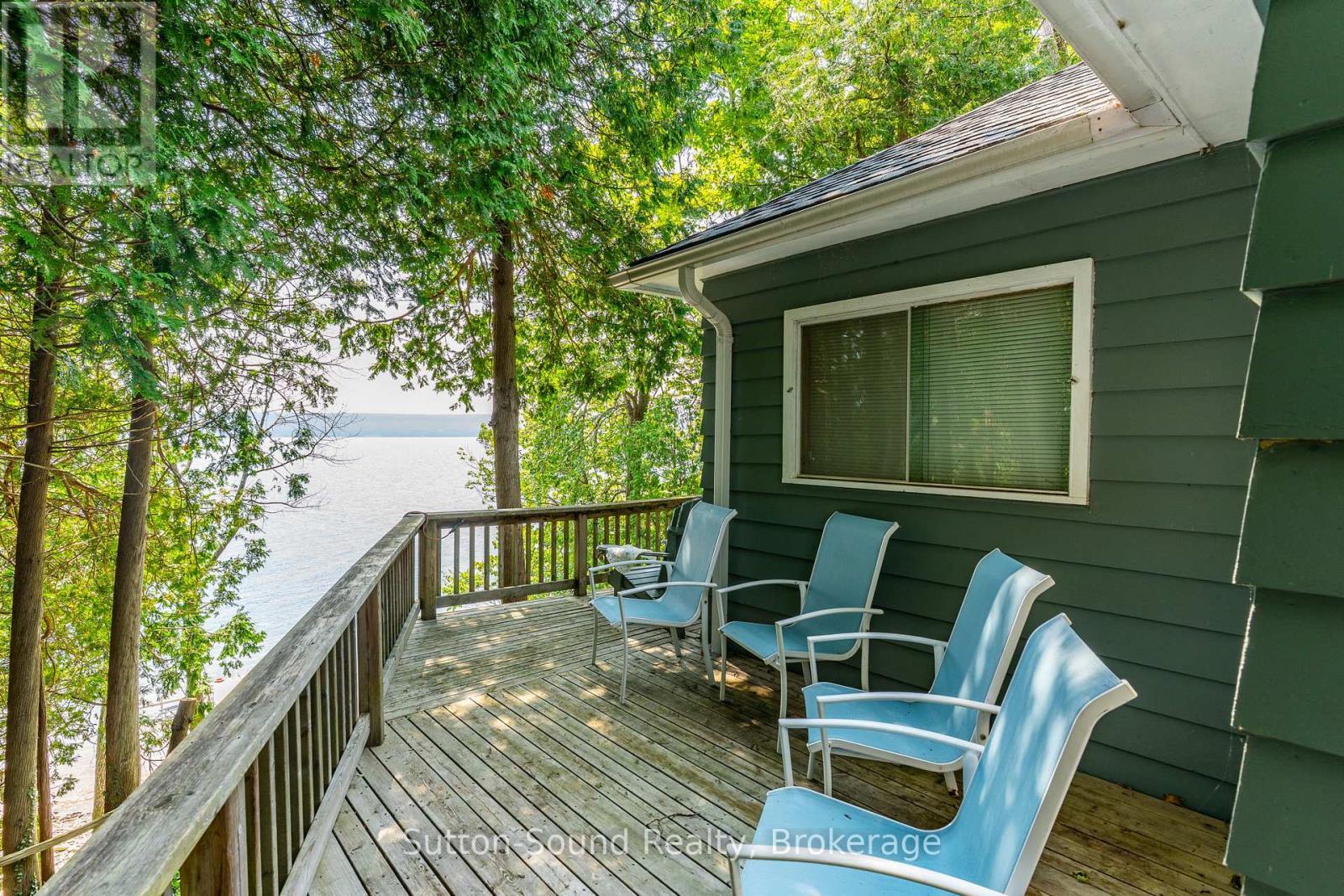 606 Mallory Beach Road, South Bruce Peninsula, ON - Outdoor With Body Of Water With Deck Patio Veranda With Exterior