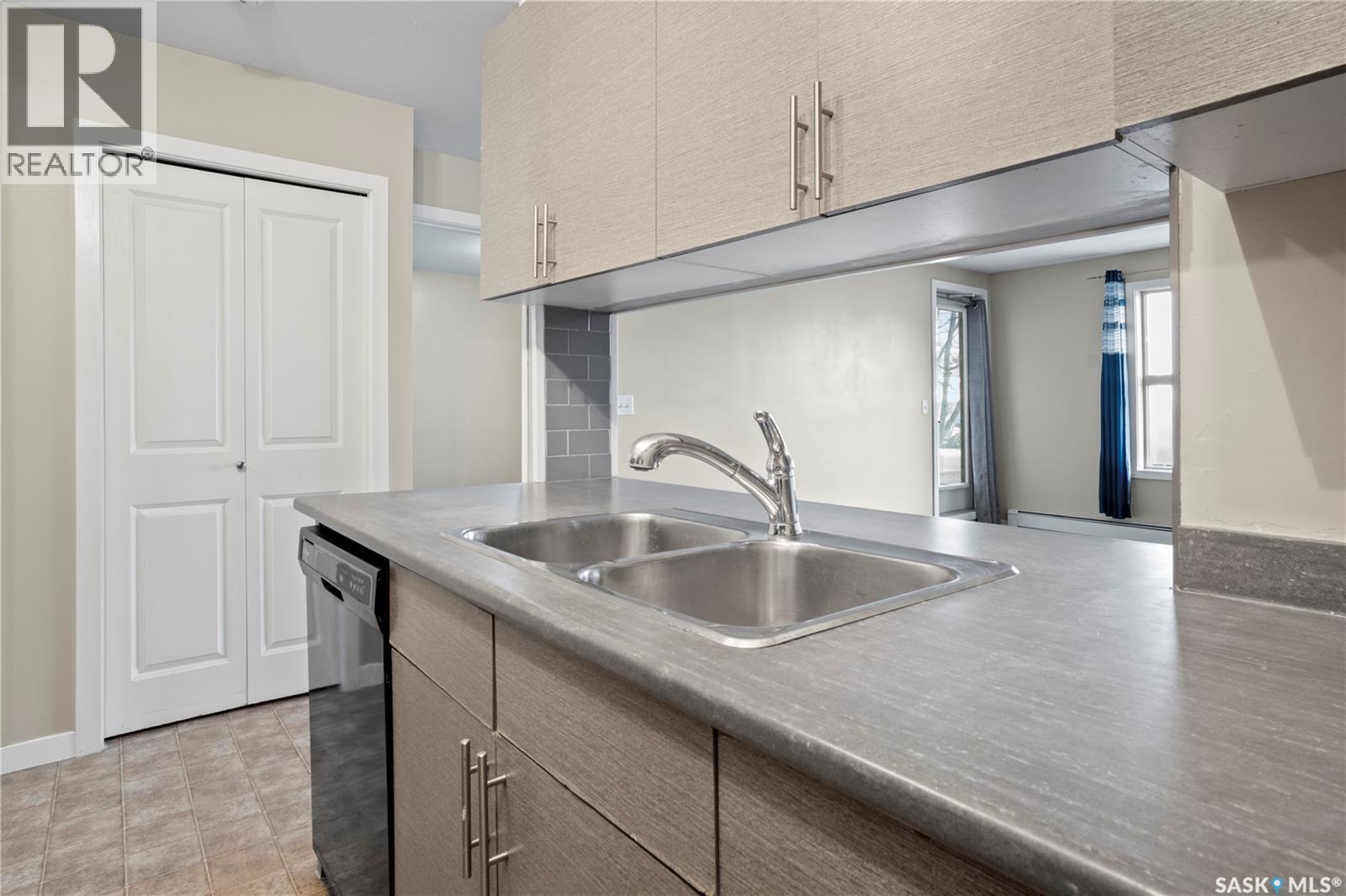 2110 5500 Mitchinson Way, Regina, SK - Indoor Photo Showing Kitchen With Double Sink