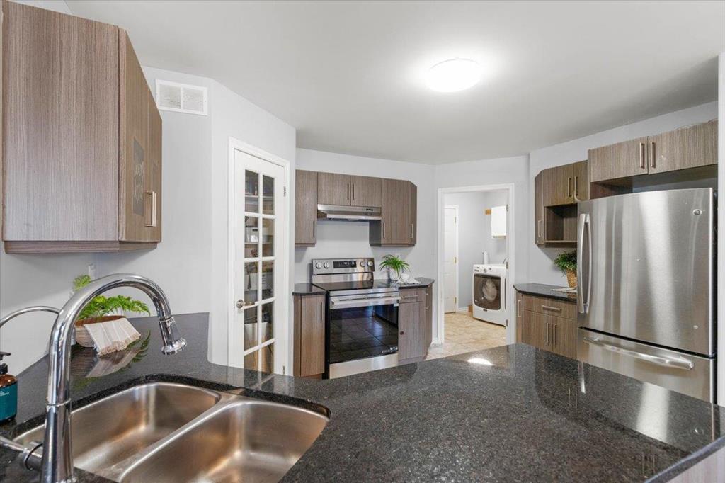 278 Laxdal Road, Winnipeg, MB - Indoor Photo Showing Kitchen With Double Sink