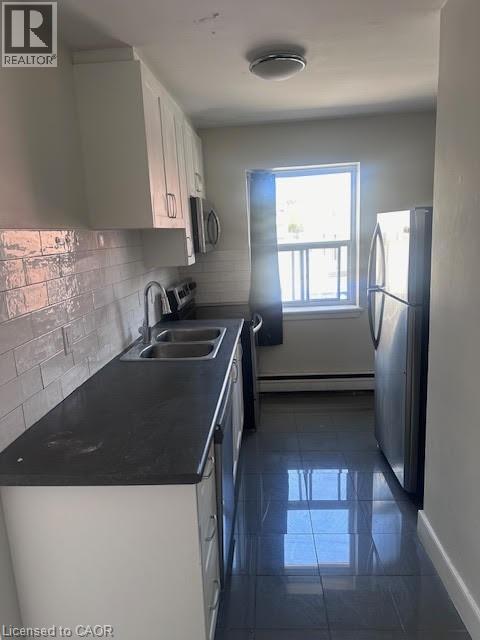 2 Grant Boulevard Unit# 8, Hamilton, ON - Indoor Photo Showing Kitchen With Double Sink