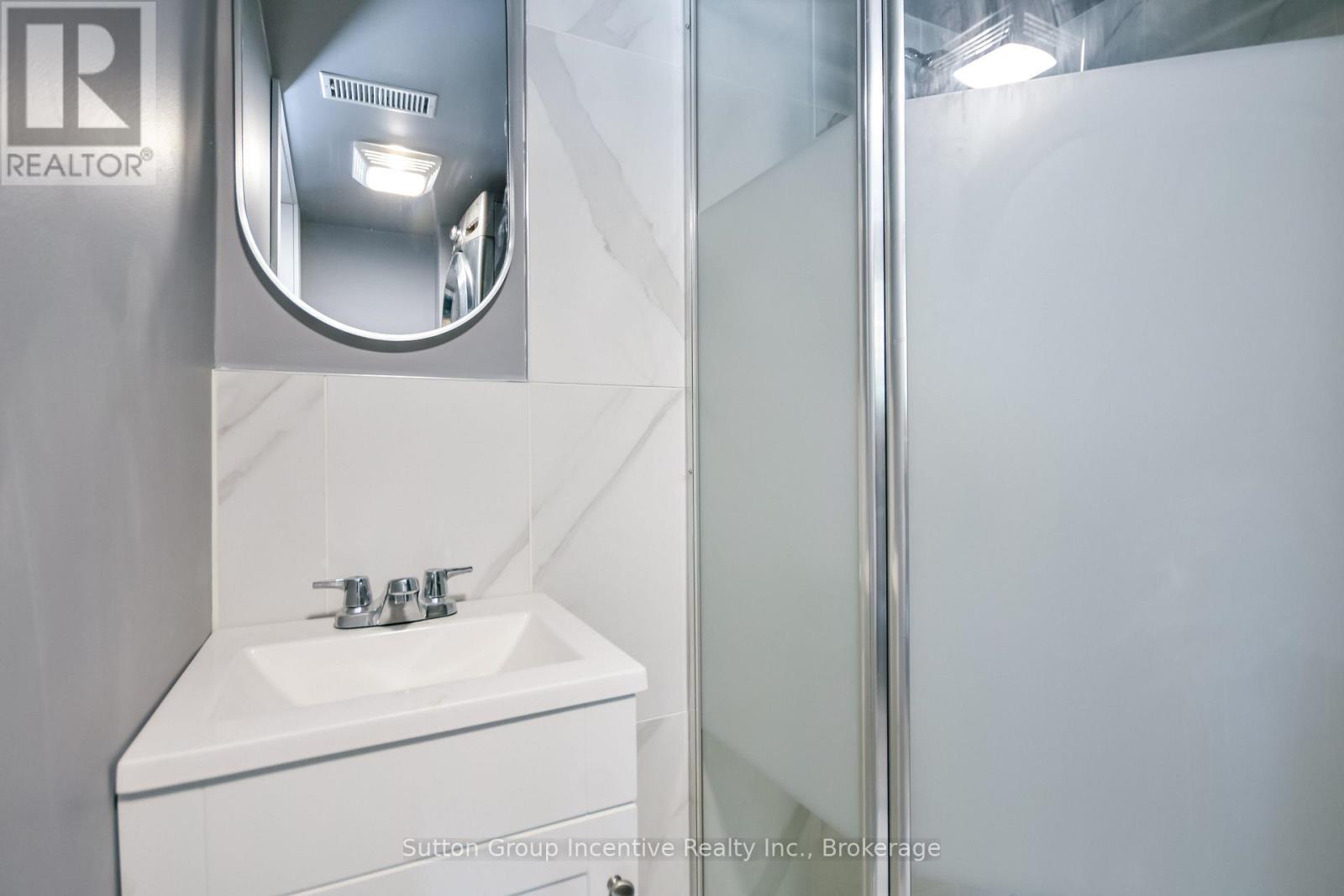 Beach House - Lower Level - 2-Piece Bath - 203 Park Road, Tiny, ON - Indoor Photo Showing Bathroom
