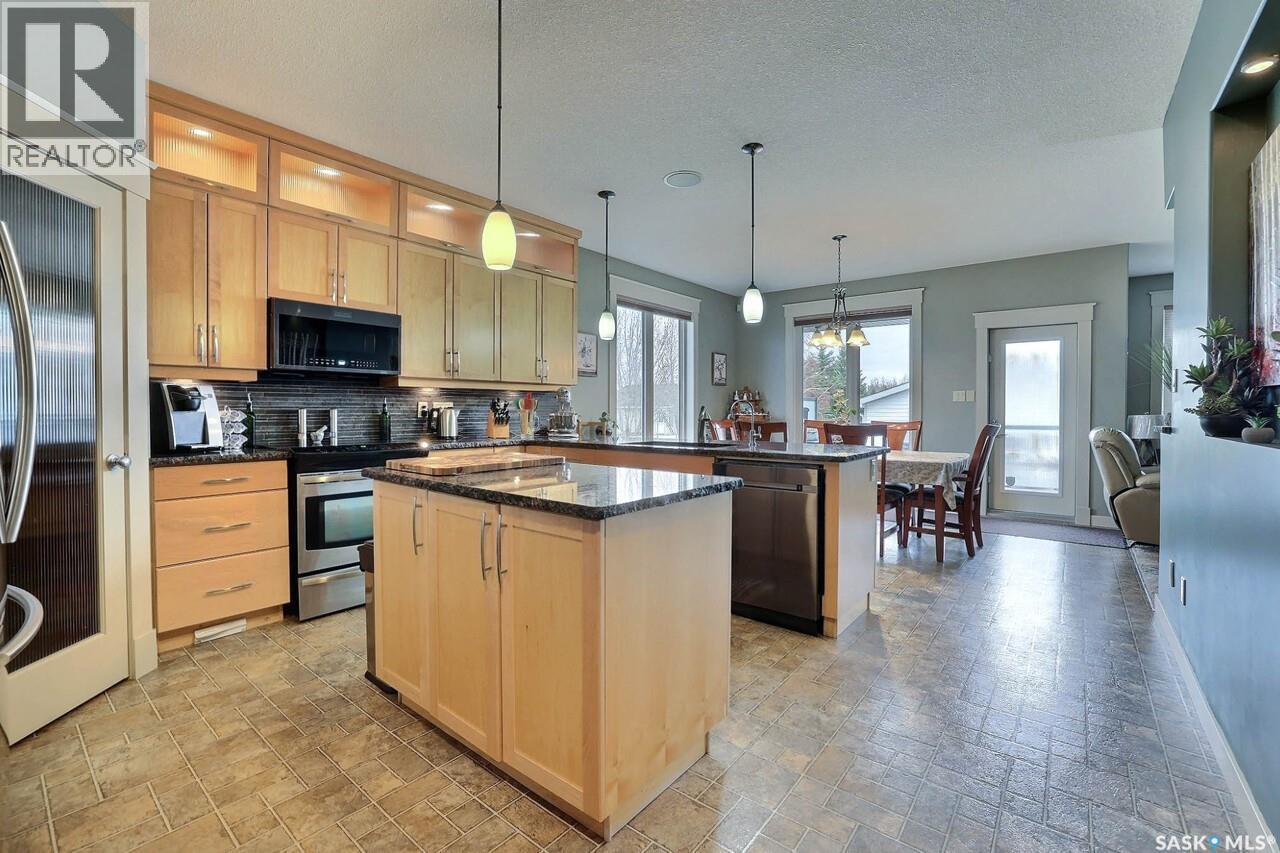 225 Willow Ridge Drive, Pilot Butte, SK - Indoor Photo Showing Kitchen With Stainless Steel Kitchen