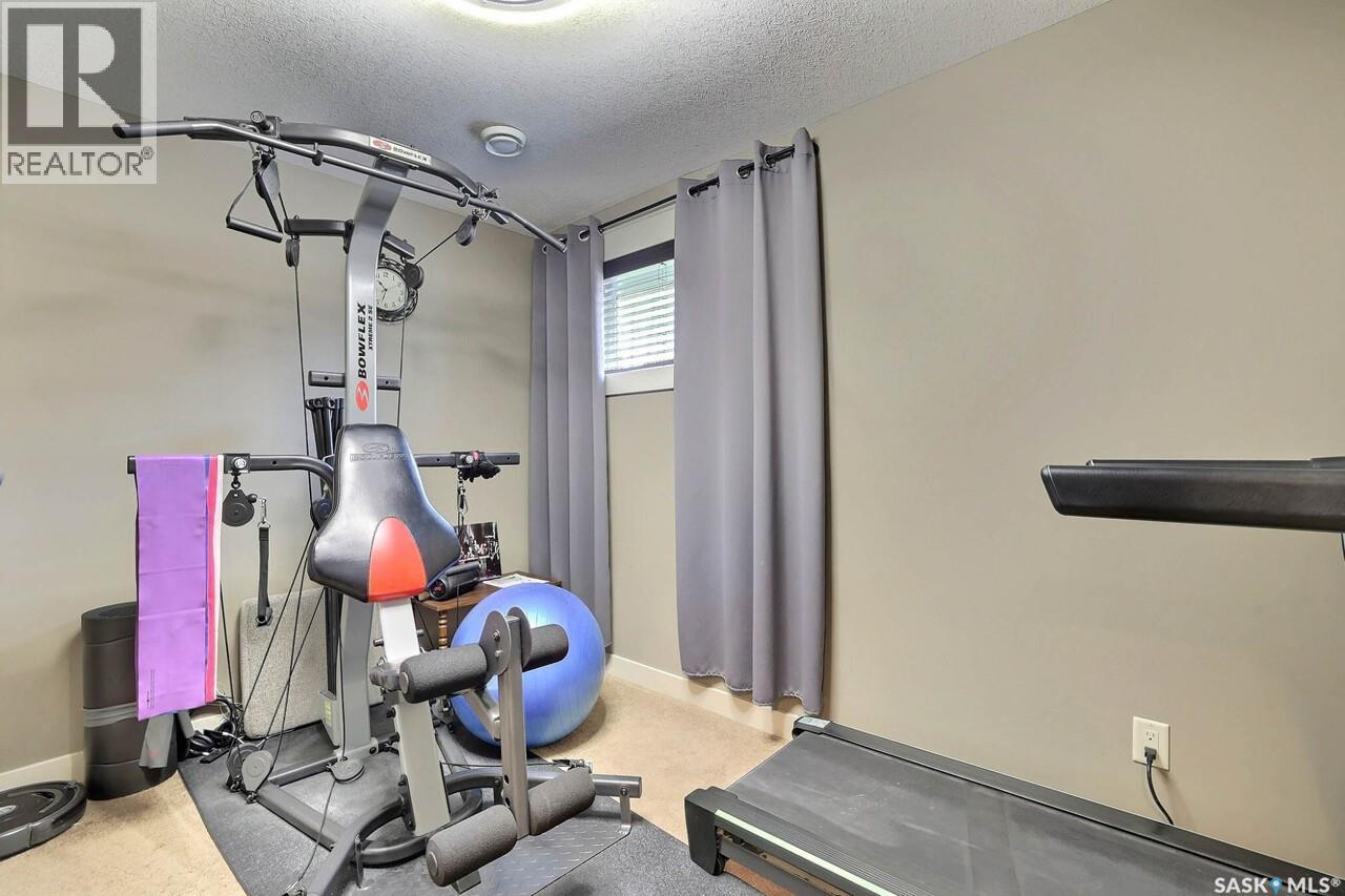 225 Willow Ridge Drive, Pilot Butte, SK - Indoor Photo Showing Gym Room