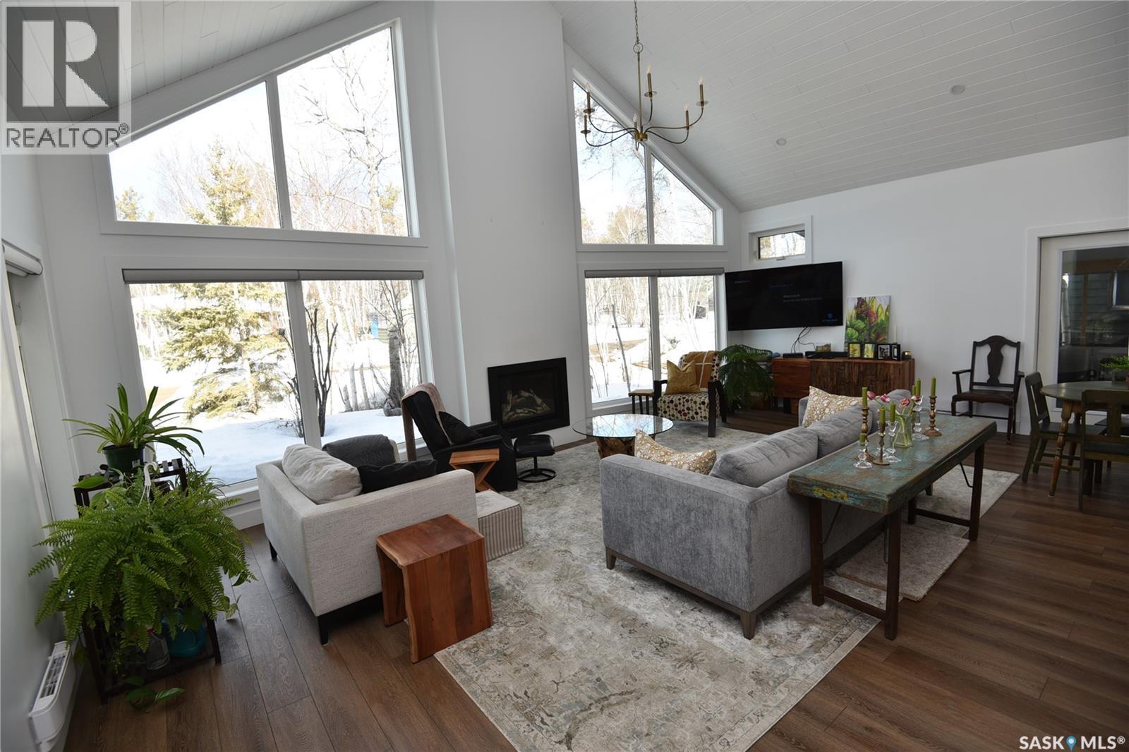213 Birch Avenue, Tobin Lake, SK - Indoor Photo Showing Living Room With Fireplace