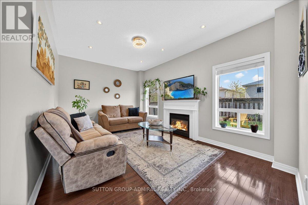 6 White Crescent, Barrie, ON - Indoor Photo Showing Living Room With Fireplace