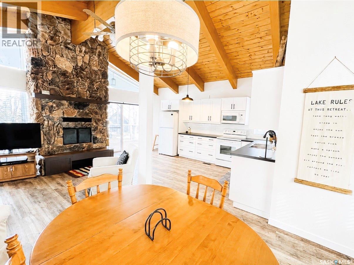 45 Mainprize Bay, Maple Bush Rm No. 224, SK - Indoor Photo Showing Dining Room With Fireplace