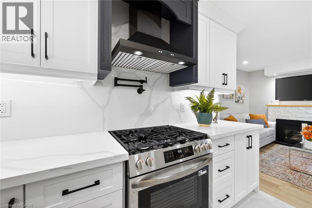 262 Broadway Avenue, Hamilton, ON - Indoor Photo Showing Kitchen With Fireplace