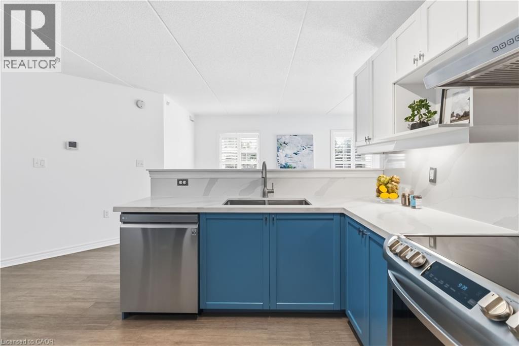 1340 Main Street E Unit# 113, Milton, ON - Indoor Photo Showing Kitchen With Double Sink