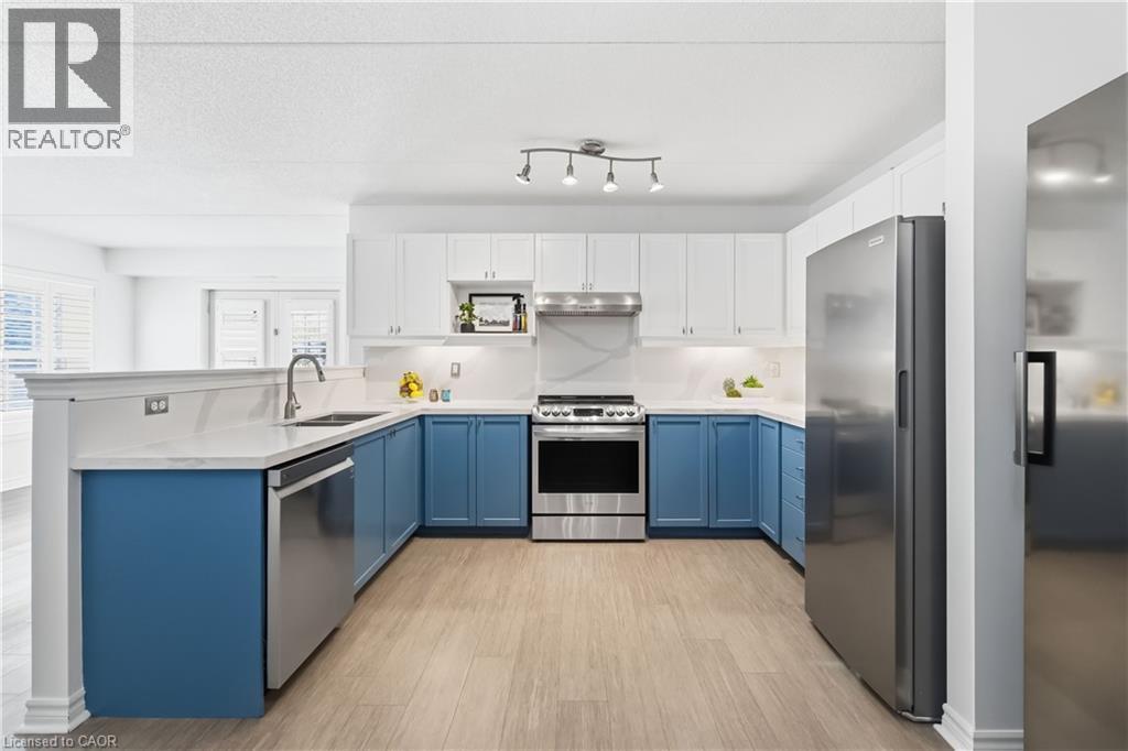 1340 Main Street E Unit# 113, Milton, ON - Indoor Photo Showing Kitchen With Stainless Steel Kitchen With Upgraded Kitchen