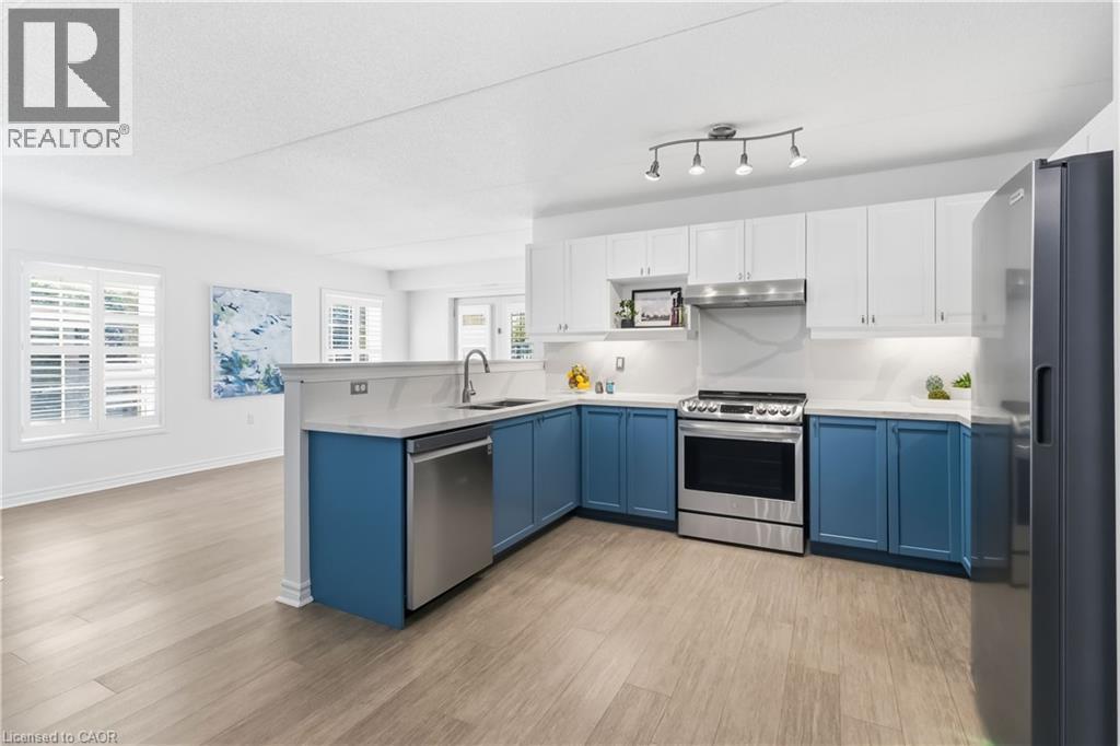 1340 Main Street E Unit# 113, Milton, ON - Indoor Photo Showing Kitchen With Stainless Steel Kitchen With Upgraded Kitchen