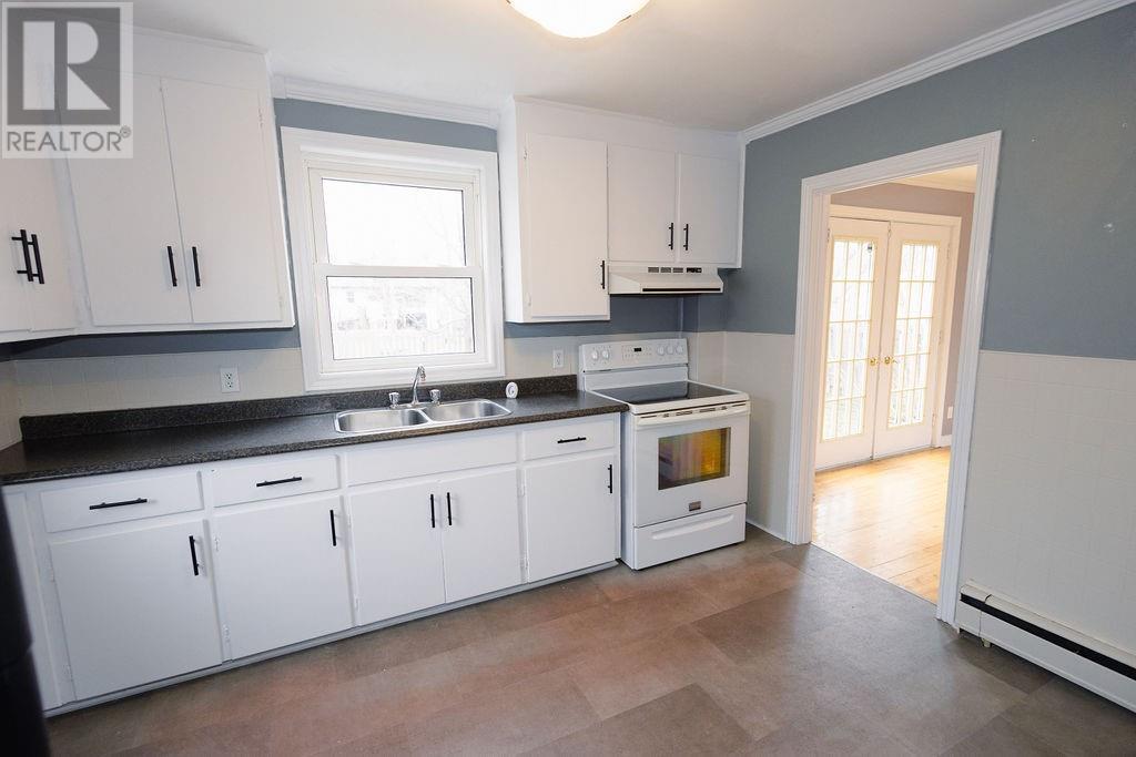 54 Hawker Crescent, Gander, NL - Indoor Photo Showing Kitchen With Double Sink