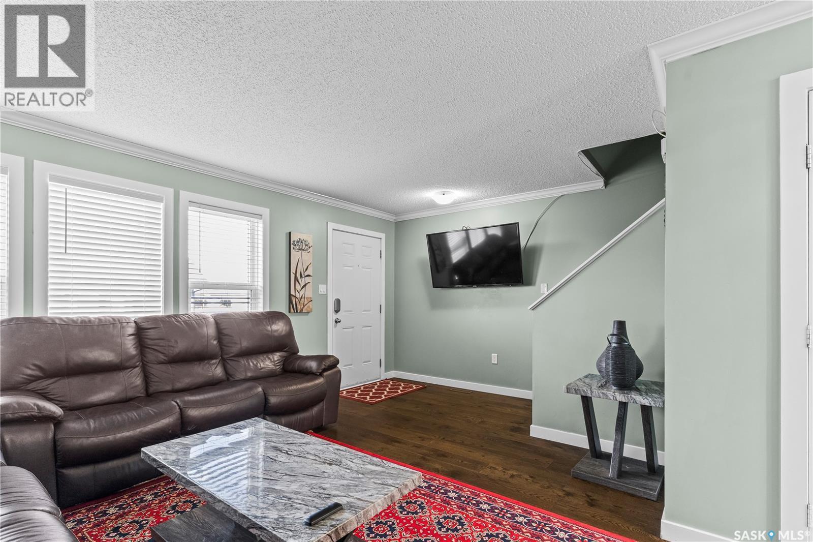 68 235 Rosewood Boulevard E, Saskatoon, SK - Indoor Photo Showing Living Room