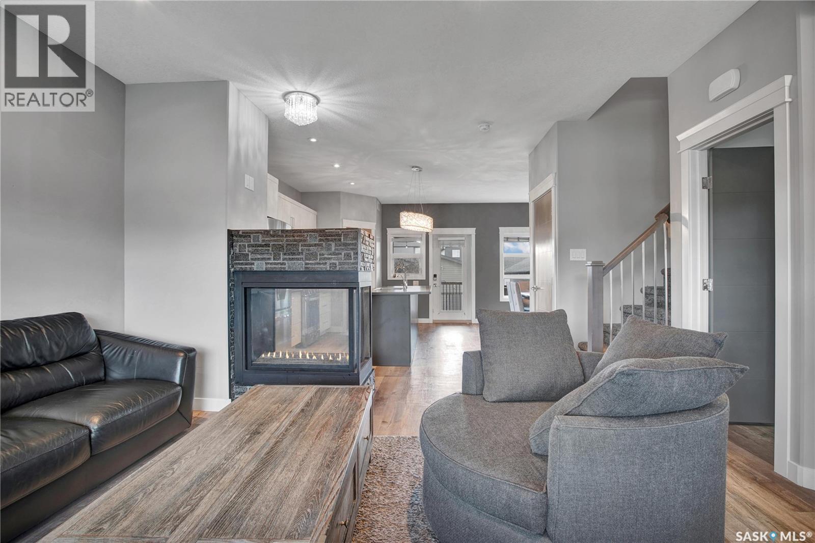923 Kloppenburg Crescent, Saskatoon, SK - Indoor Photo Showing Living Room With Fireplace