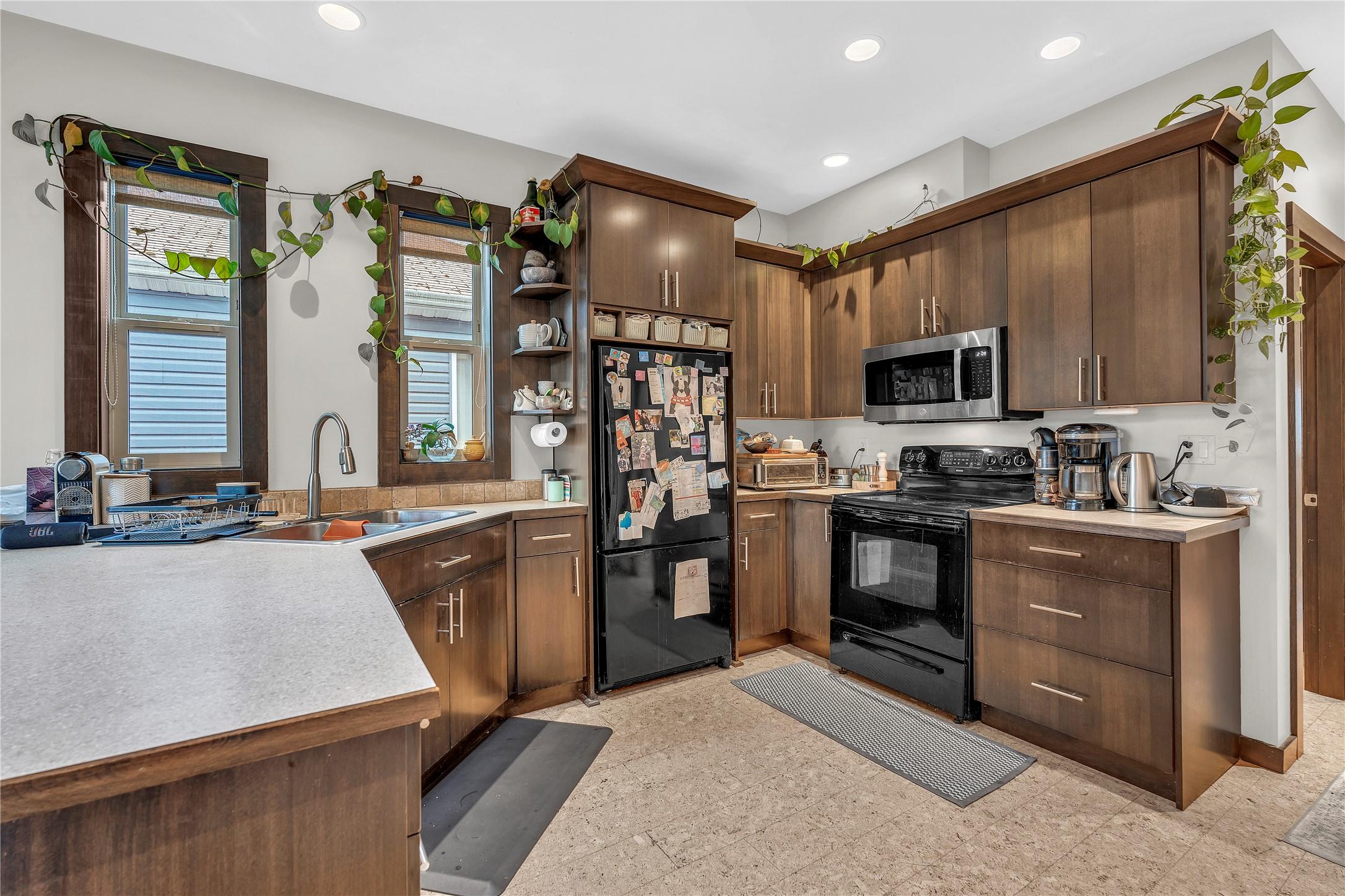 102-653 Papineau Street, Penticton, BC - Indoor Photo Showing Kitchen With Double Sink